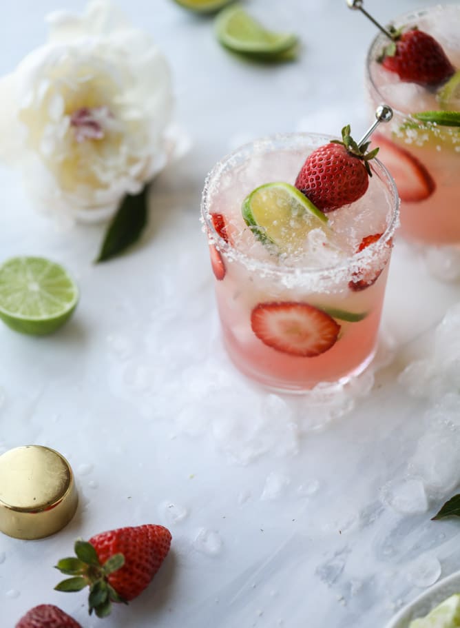smoked strawberry mezcal margaritas I howsweeteats.com #margaritas #mezcal #strawberry #lime