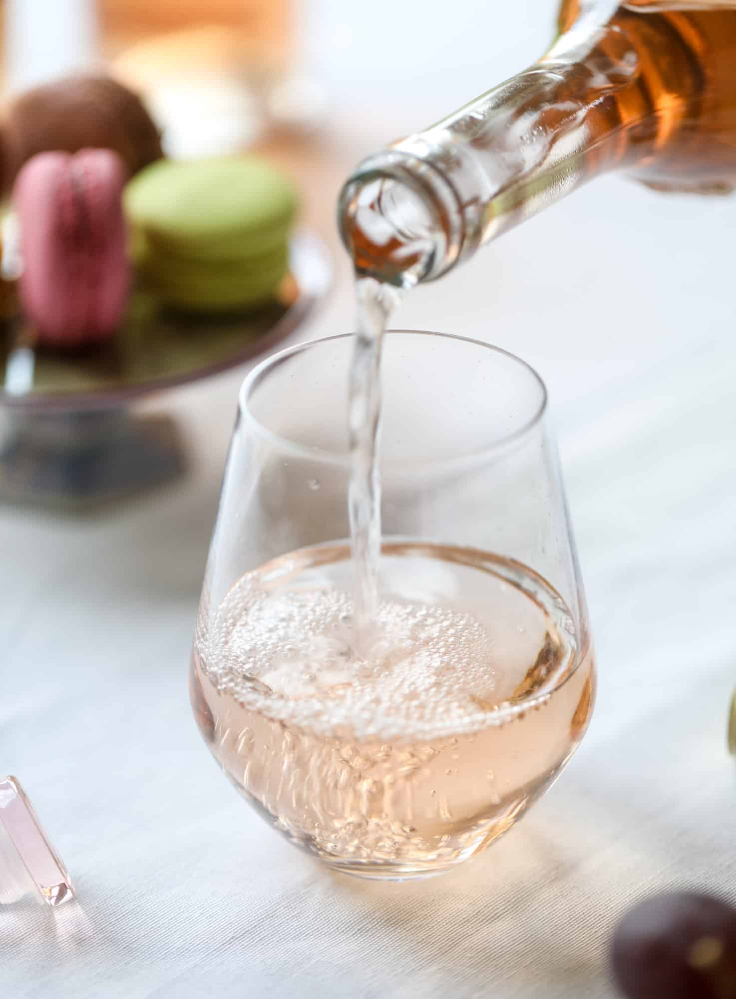 The best rosé to drink - all here in one epic summer guide for you! I'm sharing my personal favorite top ten rosé wines to drink in summer 2018, along with the perfect cheese board and snacks to go with. I howsweeteats.com #rosé #rose #summer #2018 #cheeseboard
