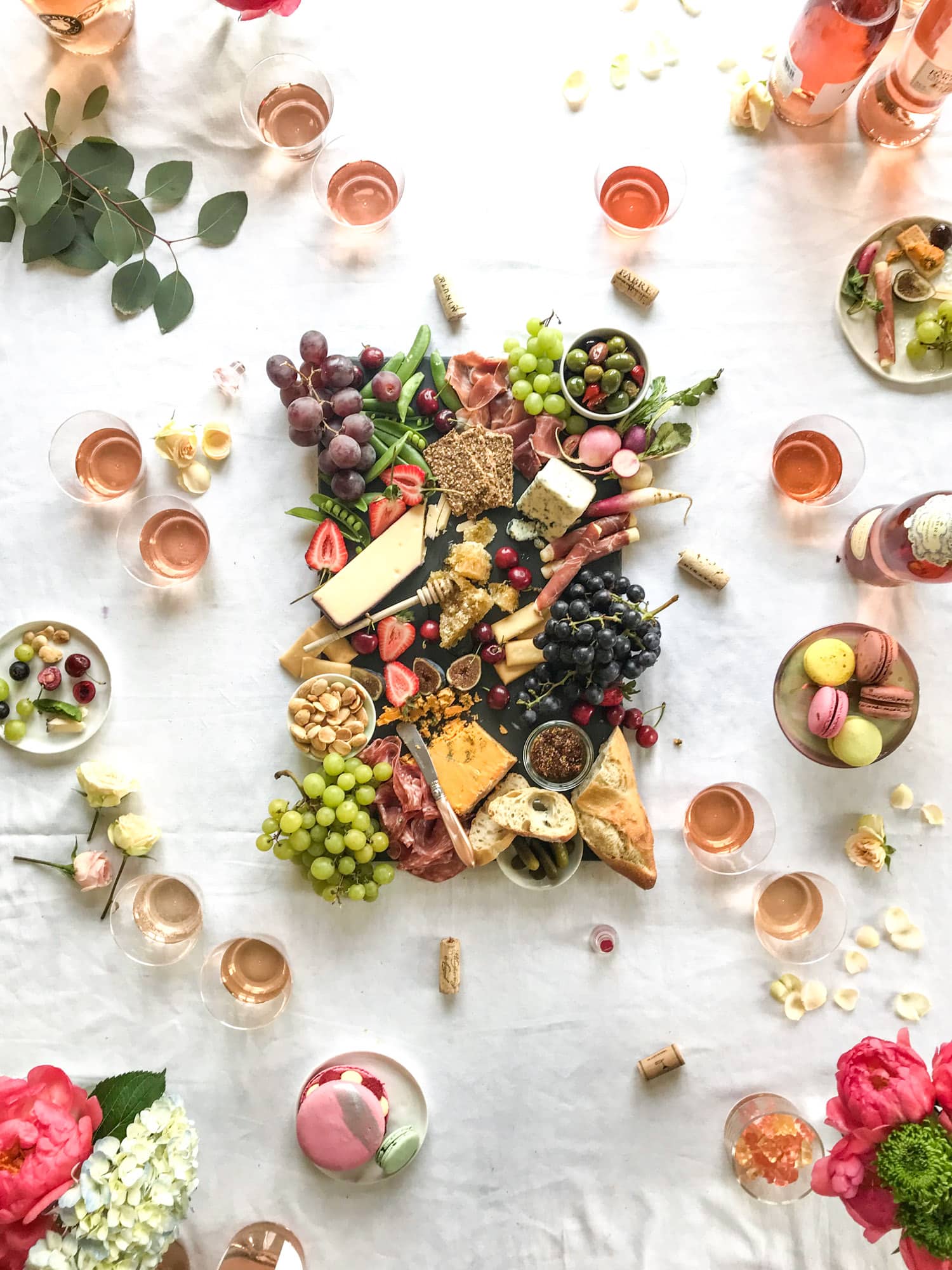 The best rosé to drink - all here in one epic summer guide for you! I'm sharing my personal favorite top ten rosé wines to drink in summer 2018, along with the perfect cheese board and snacks to go with. I howsweeteats.com #rosé #rose #summer #2018 #cheeseboard