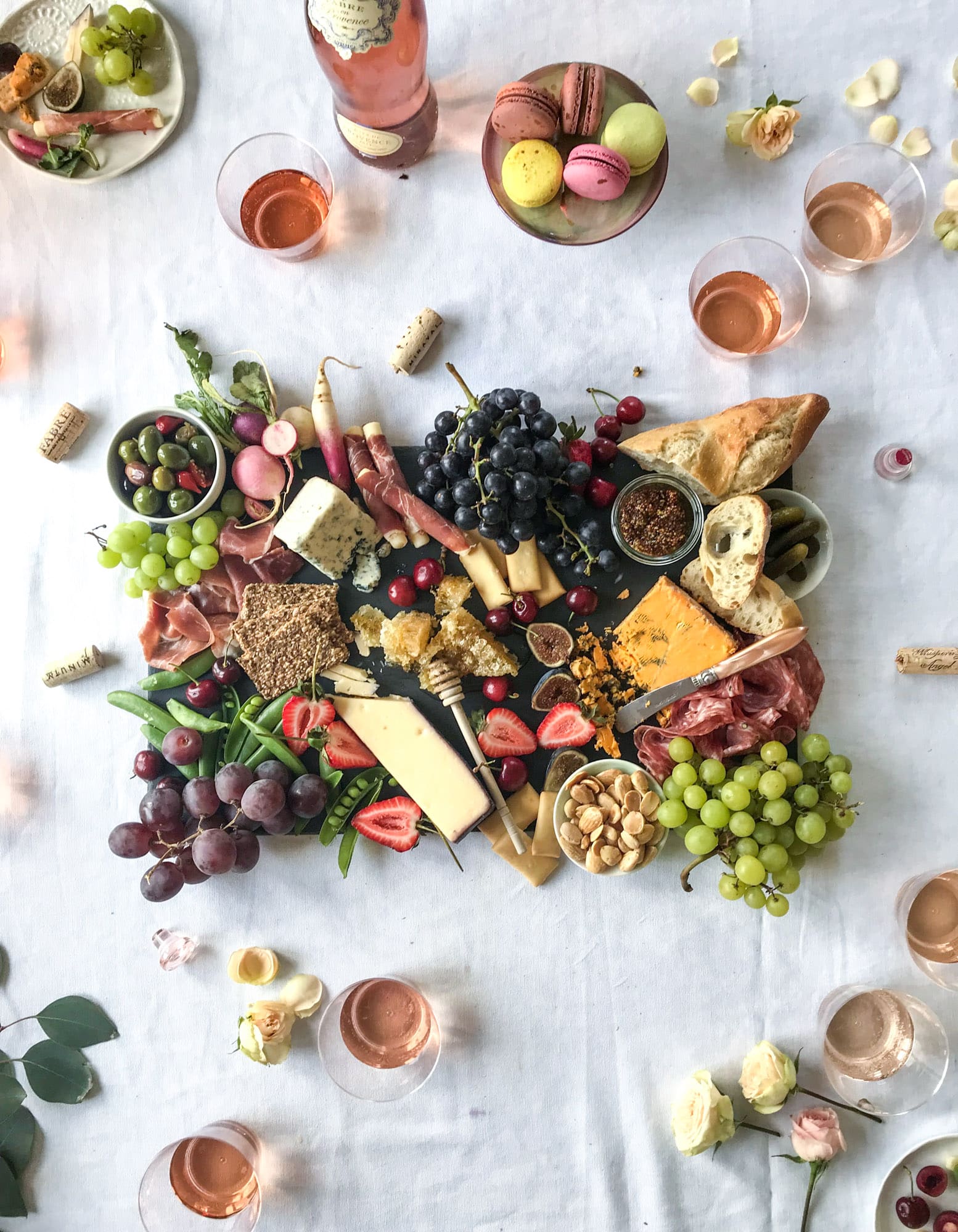 The best rosé to drink - all here in one epic summer guide for you! I'm sharing my personal favorite top ten rosé wines to drink in summer 2018, along with the perfect cheese board and snacks to go with. I howsweeteats.com #rosé #rose #summer #2018 #cheeseboard