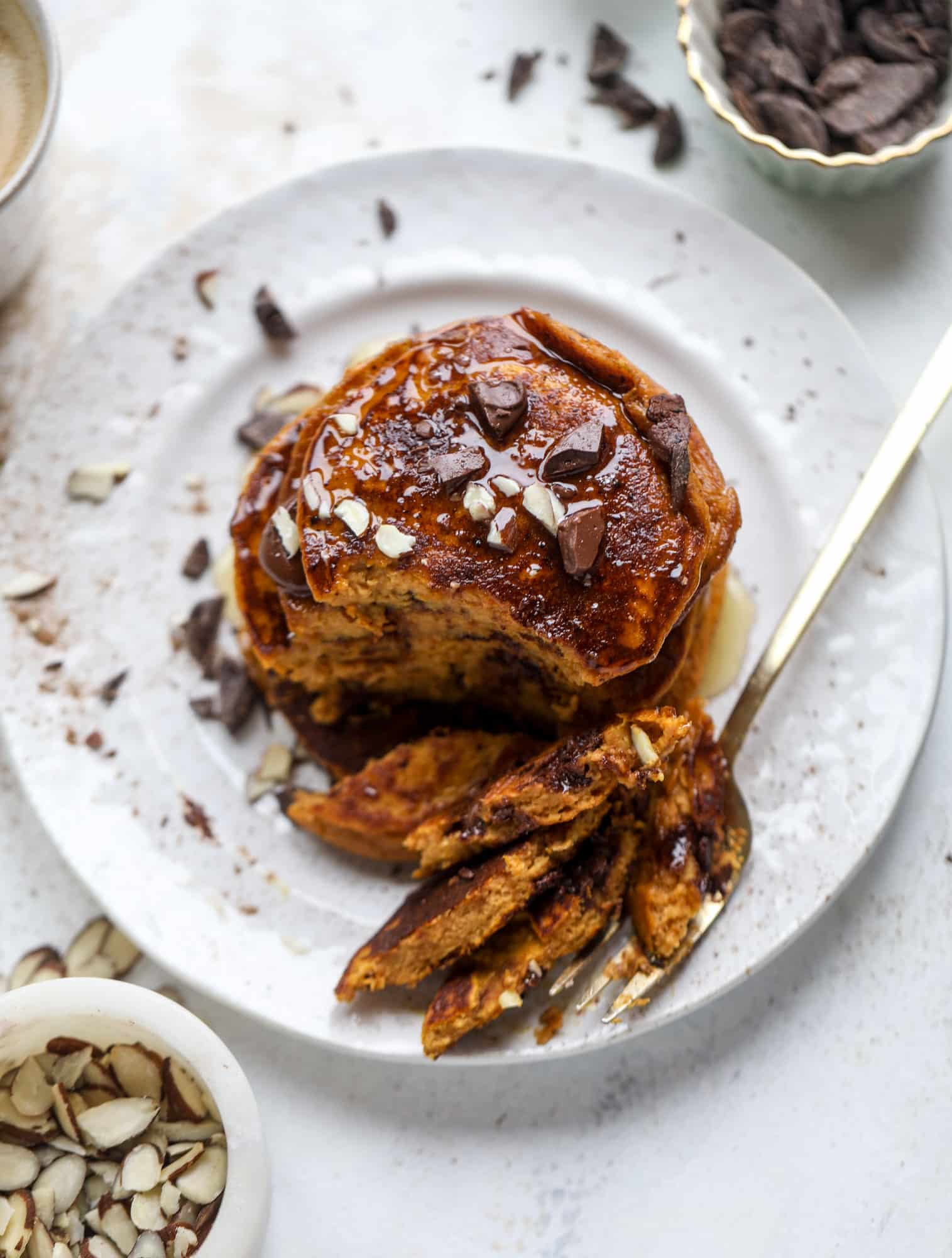These pumpkin protein pancakes are packed with delicious ingredients to make a healthy and satisfying fall breakfast! They are super easy - you throw everything into a blender to create the most incredible protein pancakes! I howsweeteats.com #protein #pancakes #pumpkin #breakfast #fall