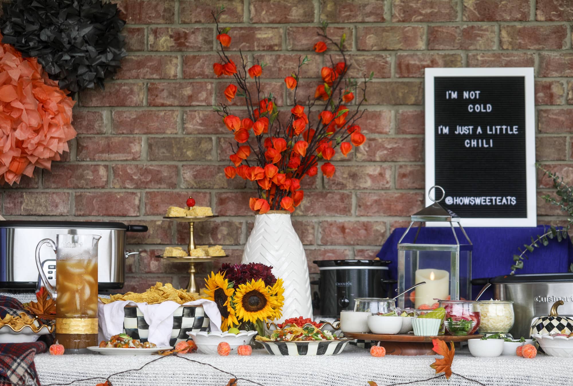 This is the best way to set up a chili bar! All my tips and tricks for setting up a perfect chili bar with multiple toppings, a nacho bar, hot dogs - all done with prep to make the day of the party super easy! This chili bar is goals. I howsweeteats.com #chili #bar #how #to