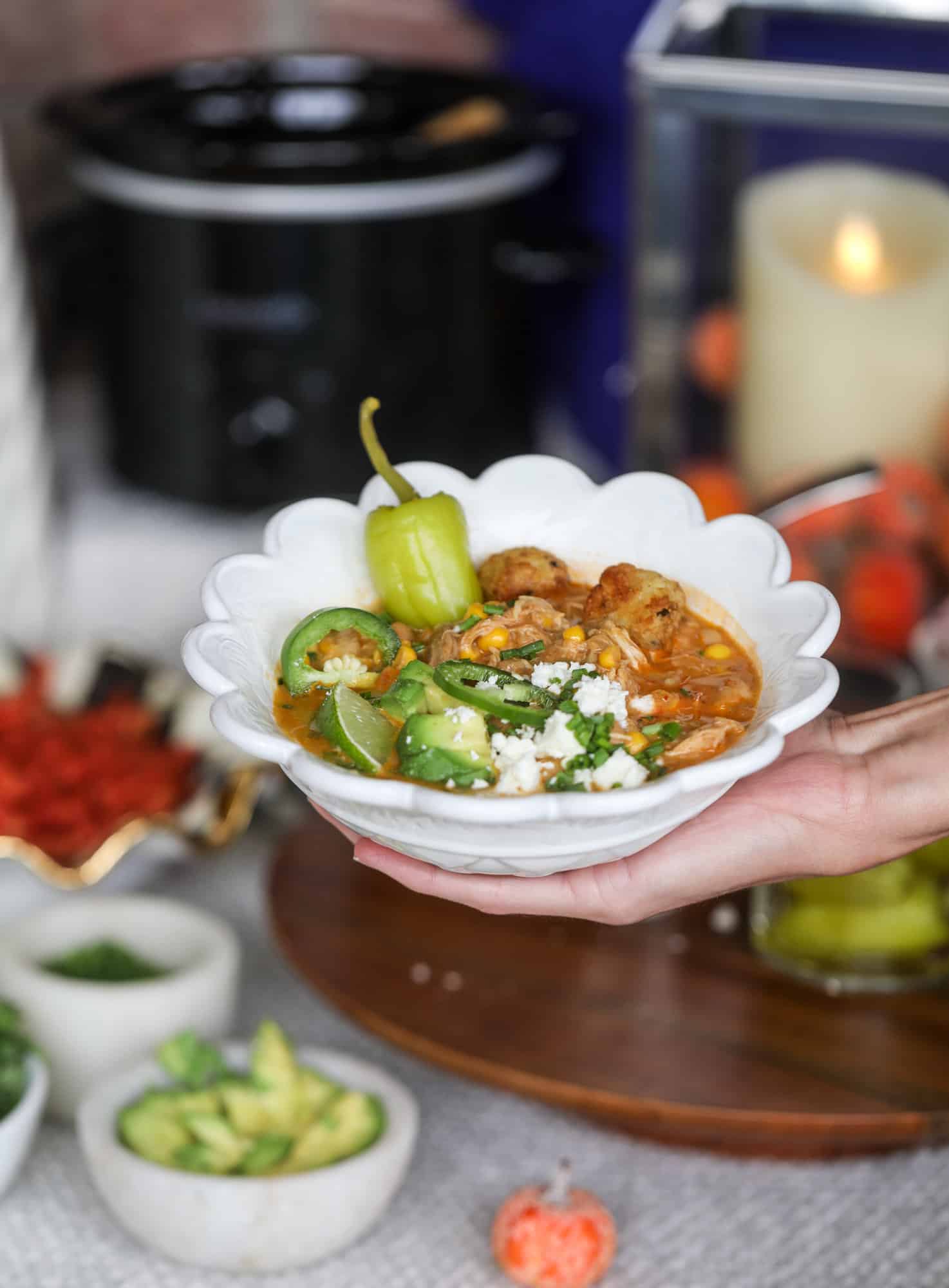 This is the best way to set up a chili bar! All my tips and tricks for setting up a perfect chili bar with multiple toppings, a nacho bar, hot dogs - all done with prep to make the day of the party super easy! This chili bar is goals. I howsweeteats.com #chili #bar #how #to