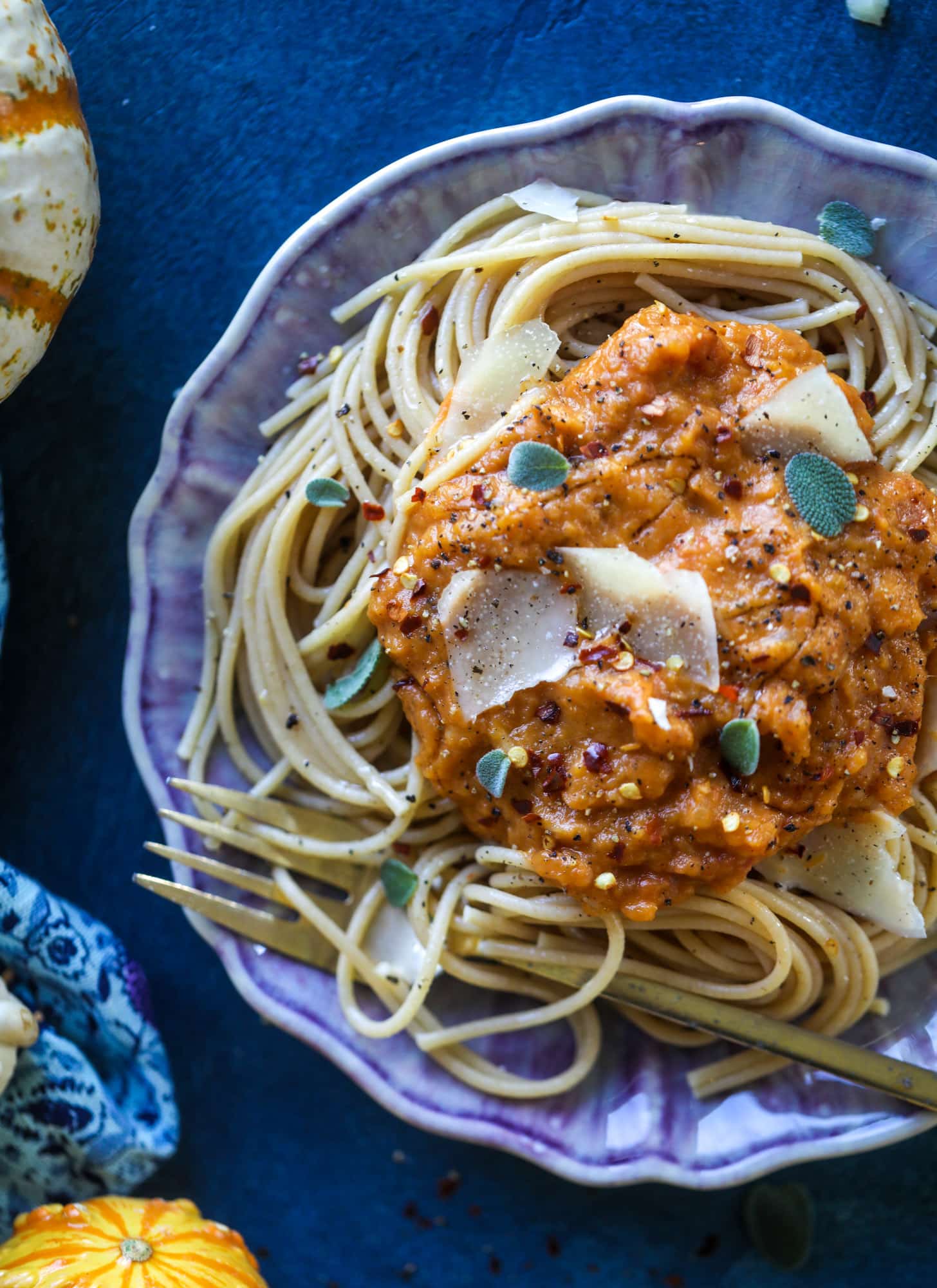 This butternut squash pasta sauce is heaven for an October dinner! Fire roasted tomatoes, butternut squash, pumpkin, sage, spice and parmesan all come together to create a delicious, simmered pot of sauce to blanket your favorite pasta! I howsweeteats.com #butternut #squash #pasta #sauce
