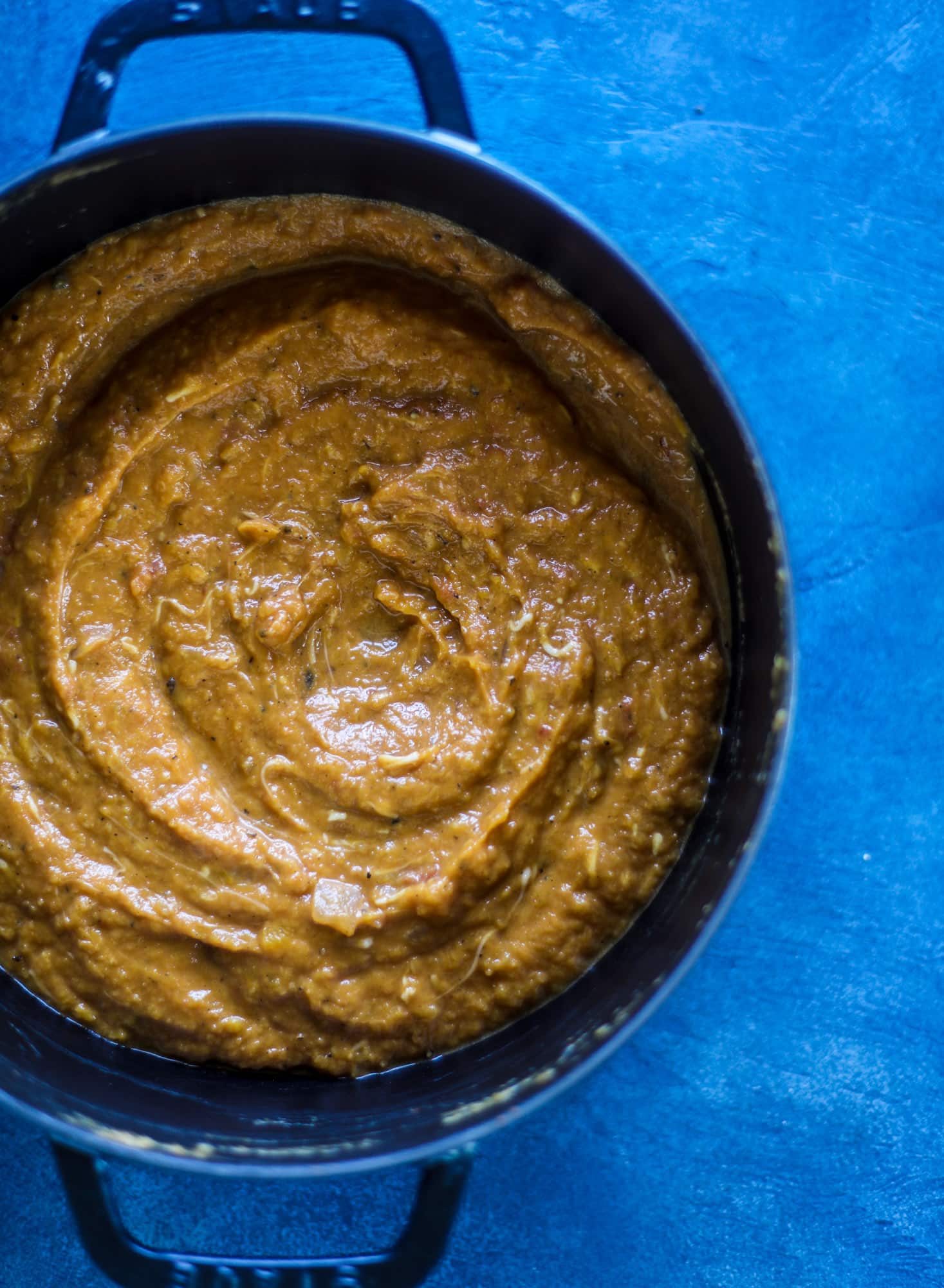 This butternut squash pasta sauce is heaven for an October dinner! Fire roasted tomatoes, butternut squash, pumpkin, sage, spice and parmesan all come together to create a delicious, simmered pot of sauce to blanket your favorite pasta! I howsweeteats.com #butternut #squash #pasta #sauce