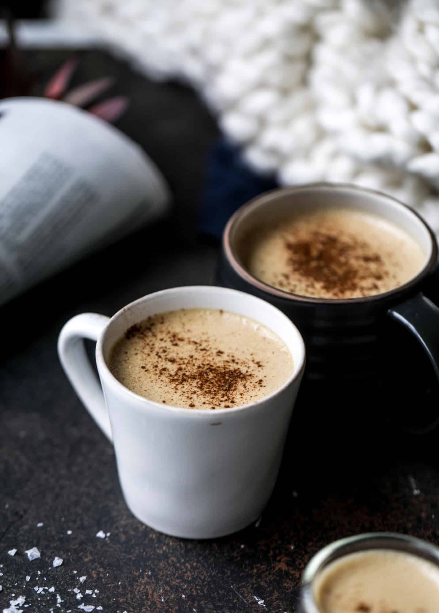 This salted maple power coffee is the perfect creamy pick-me up. Maple syrup, coconut butter and sea salt are blended with hot coffee to make the most deliciously whipped hot, frothy latte-like drink, without any dairy! I howsweeteats.com #coffee #coconutbutter