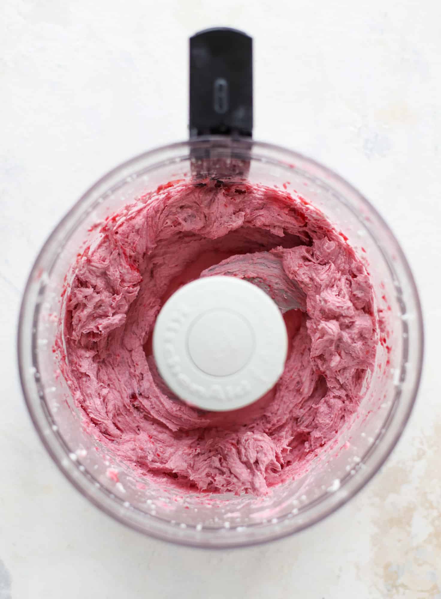 This whipped cranberry goat cheese spread is the perfect holiday appetizer! You can make it ahead of time and serve it with a cheese board or bread and crackers - before or during the meal! Plus it's super pretty too! I howsweeteats.com #cranberry #goatcheese