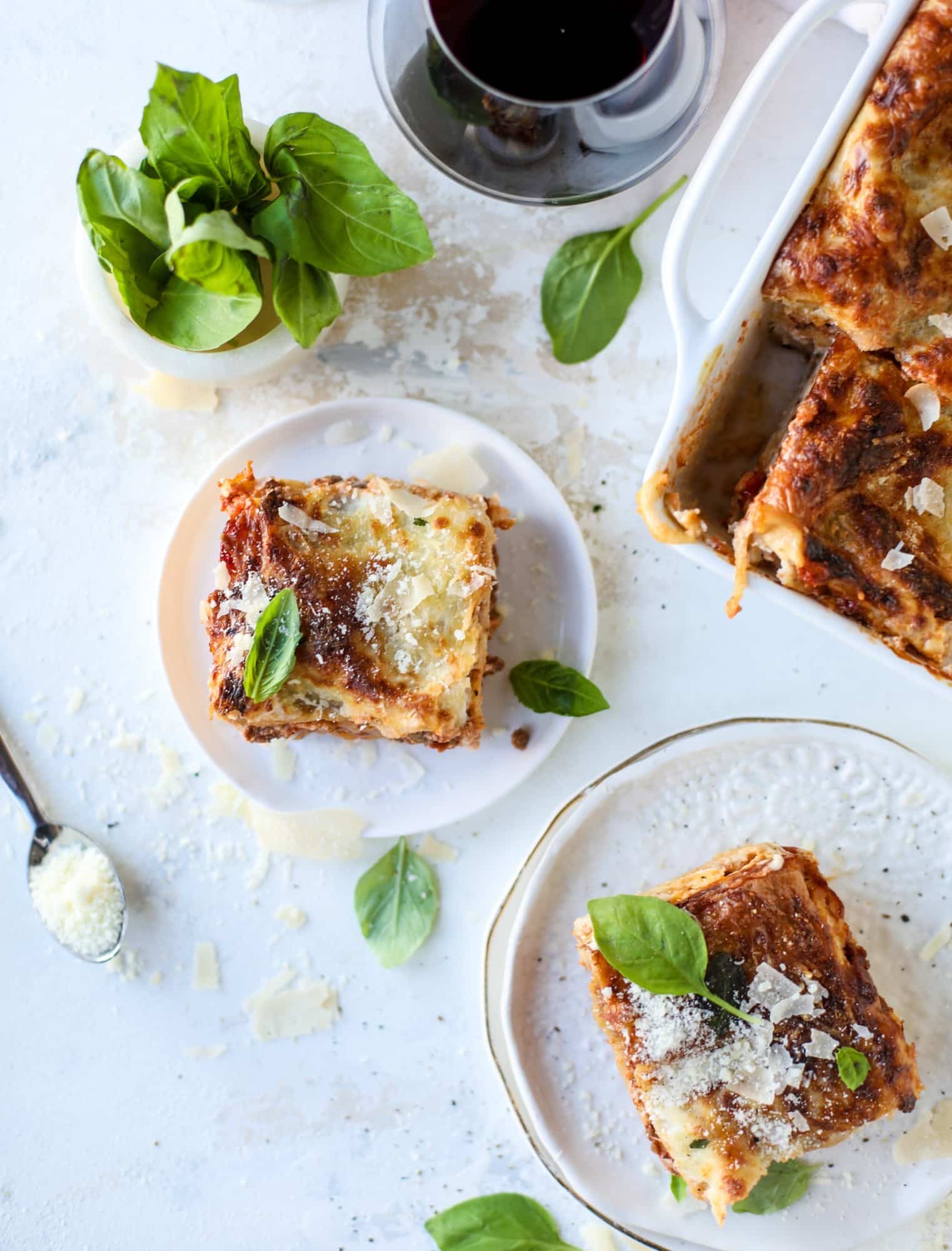This lasagna bolognese is the ultimate comfort food. Meaty sauce, whole wheat lasagna noodles, creamy bechamel and grated cheese come together to create the most perfect slice of lasagna heaven! I howsweeteats.com #lasagna #bolognese
