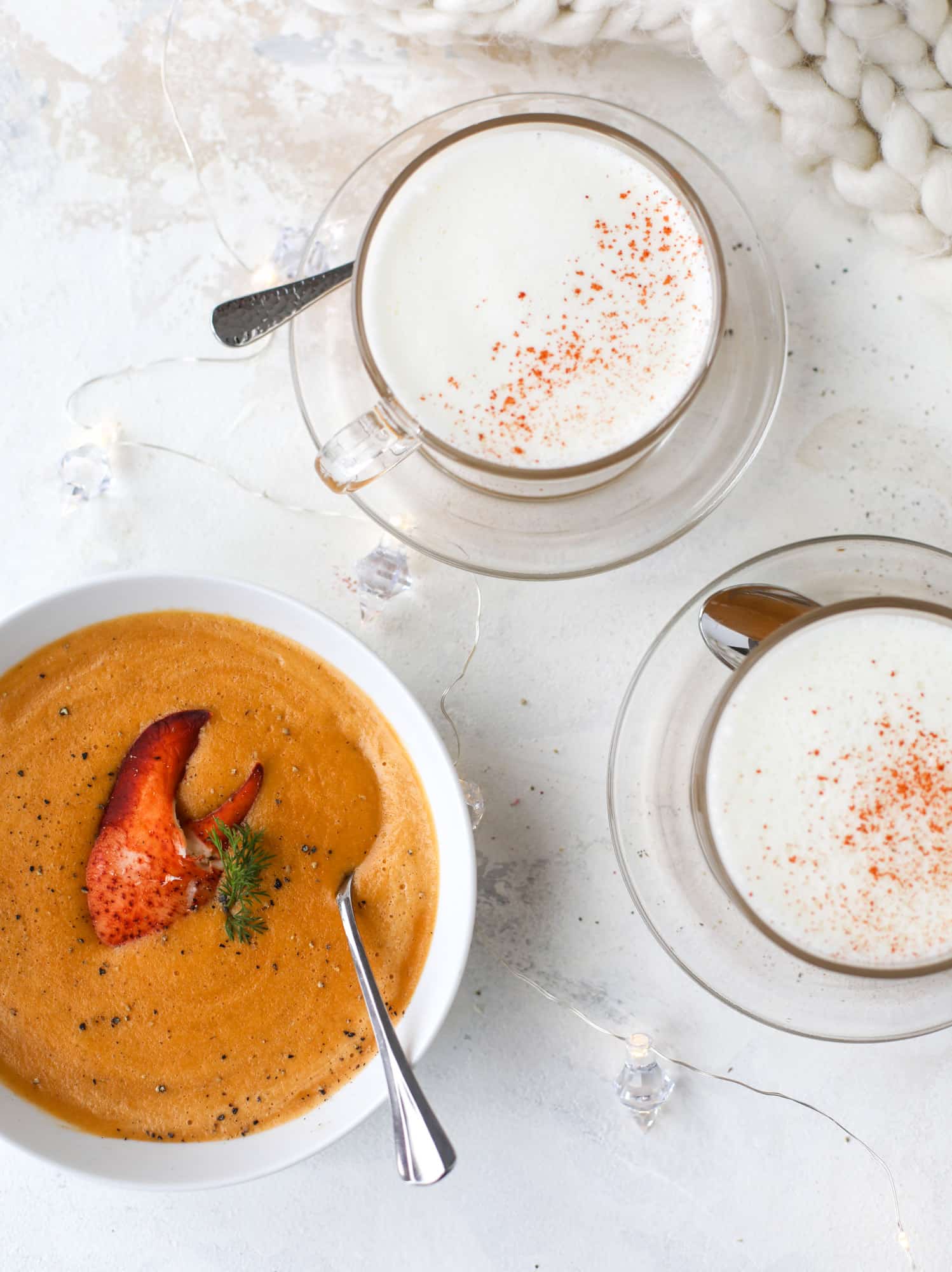 This lobster bisque recipe is delicious, easy and always a crowd pleaser! It's so simple to make at home and it's a rich, decadent treat to serve your family. I also show you how to make a lobster cappuccino, which is lobster bisque with foamed cream! I howsweeteats.com #lobster #bisque