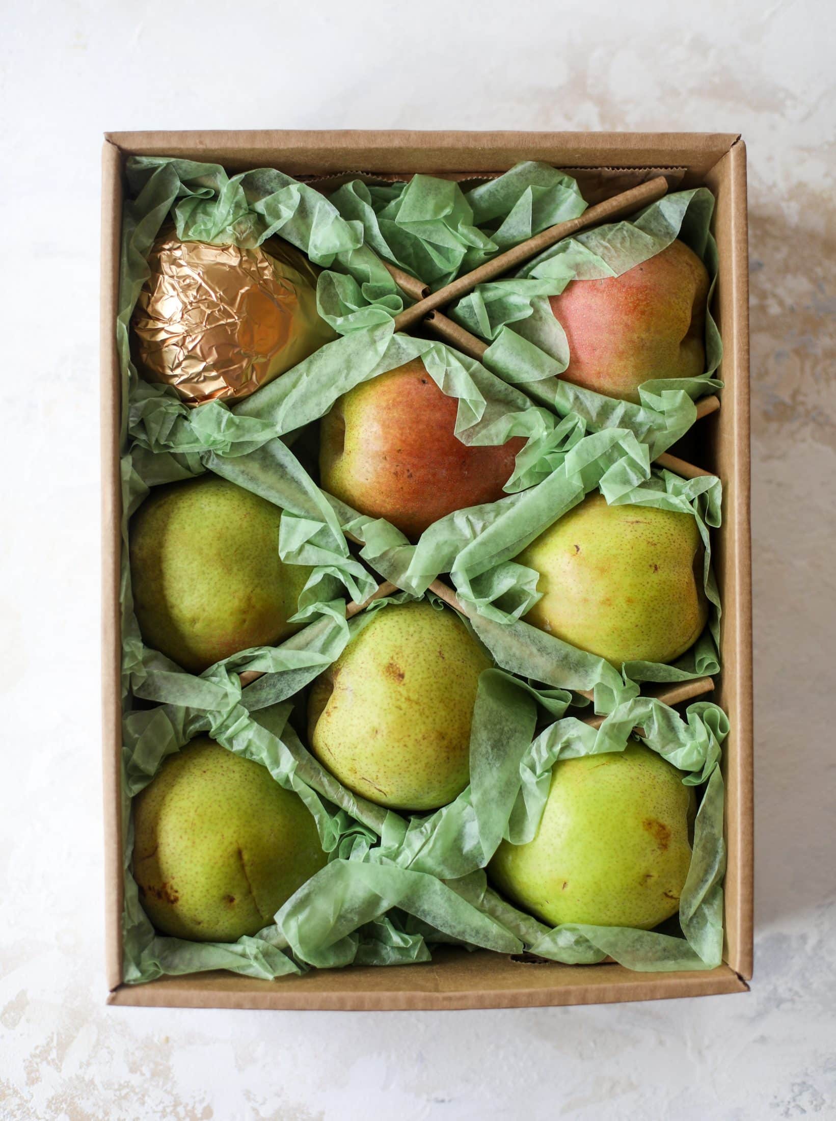 This pear mug pie is the coziest way to enjoy warm, caramelized pears. Topped with vanilla ice cream and the cutest, quick puff pastry stars, these are a great dessert for a dinner party or an easy one to make for yourself on a Saturday night! I howsweeteats.com #pear #mugpie