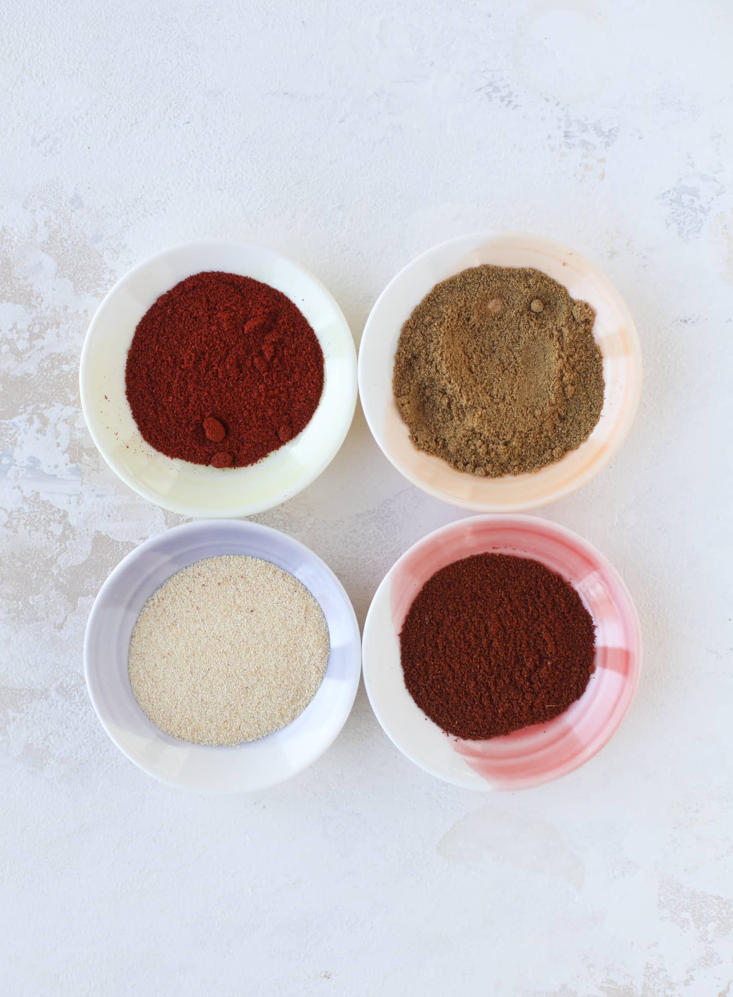 Weeknight ground beef tacos that are anything like the 90s! These are made with a homemade taco seasoning and served with the perfect toppings! I howsweeteats.com #groundbeef #tacos