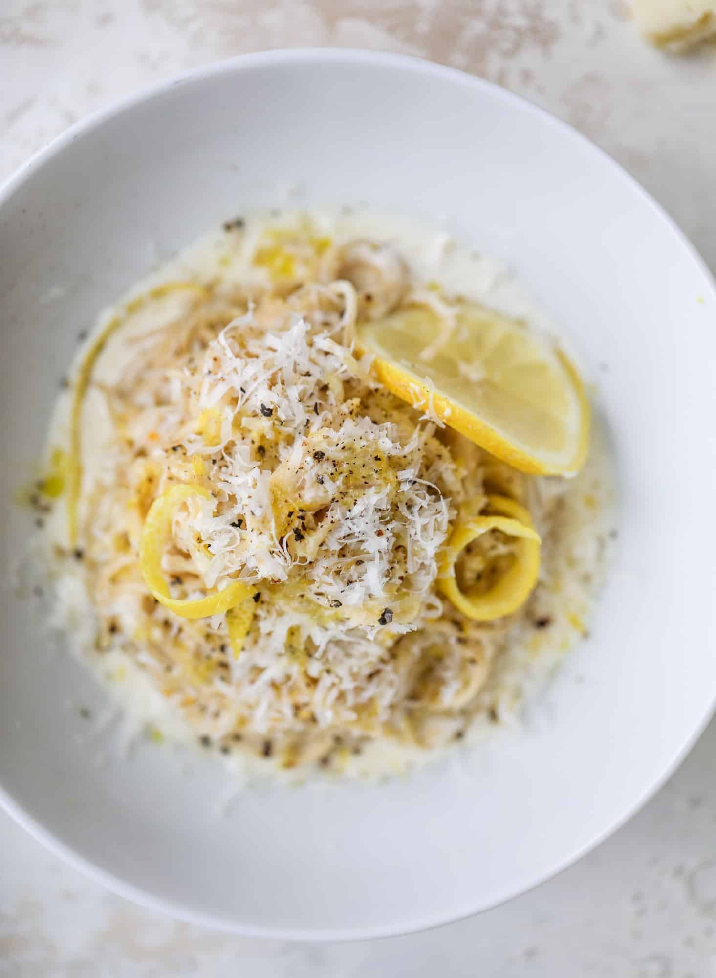 This cozy lemon pasta is light, refreshing and perfect for dinner when paired with a simple greens salad. It comes together in 20 minutes! I howsweeteats.com #lemon #pasta