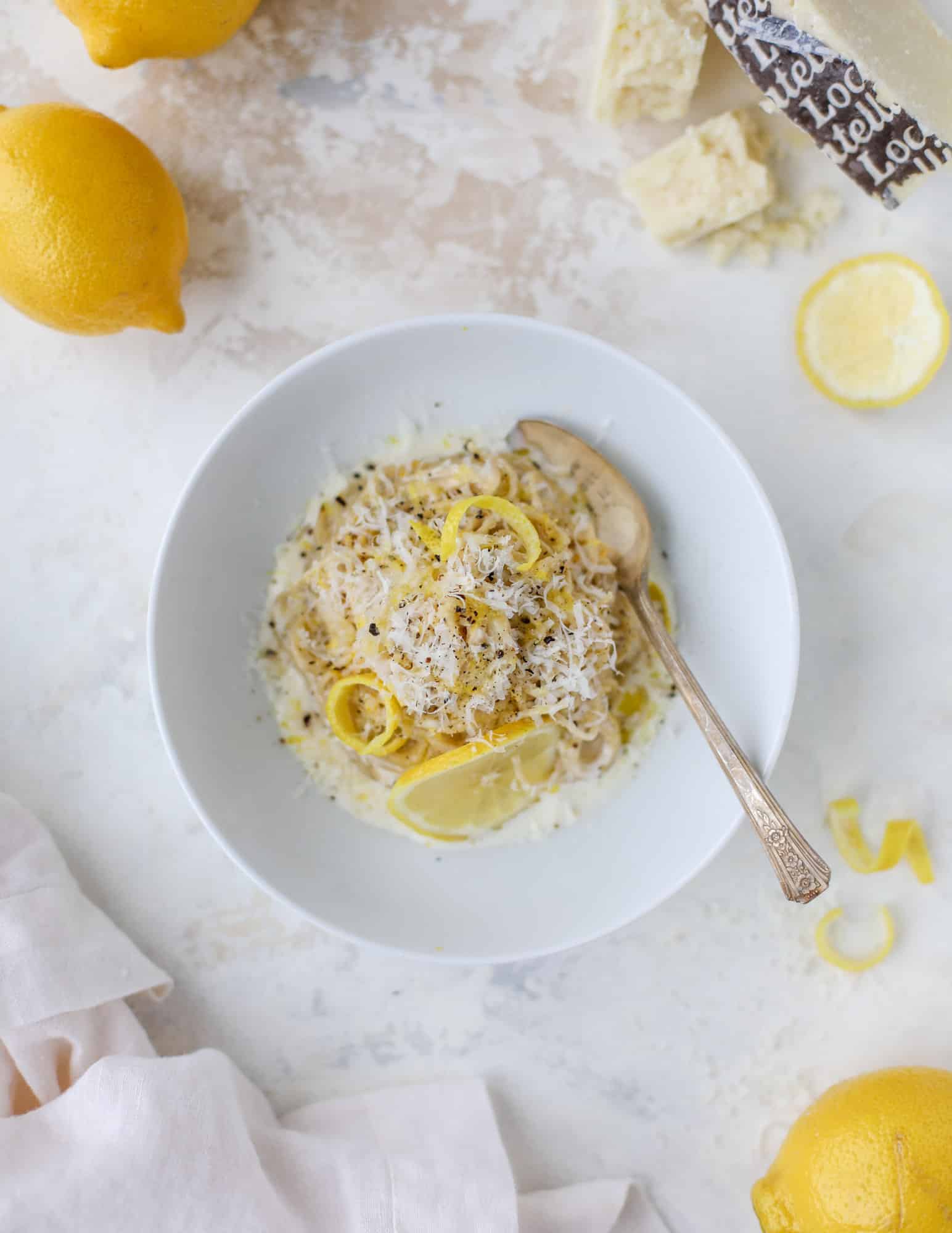 This cozy lemon pasta is light, refreshing and perfect for dinner when paired with a simple greens salad. It comes together in 20 minutes! I howsweeteats.com #lemon #pasta