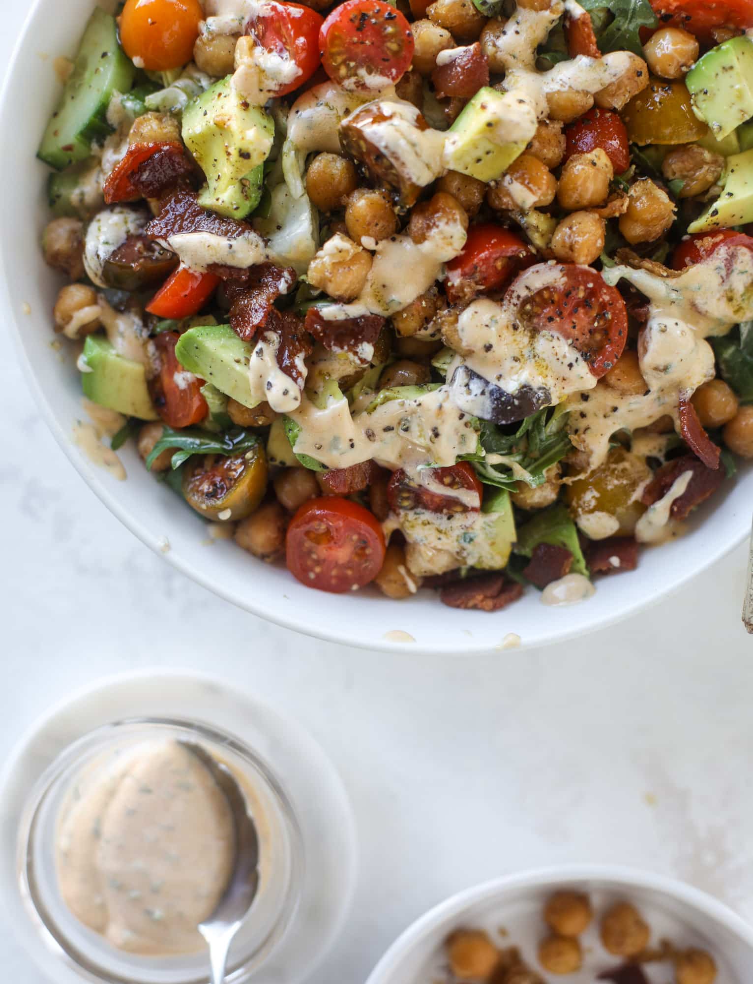 The chickpea bacon ranch salad has a ton of crispy, crunchy texture and flavor. It's satisfying and super easy to prep ahead of time too! I howsweeteats.com #chickpea #salad