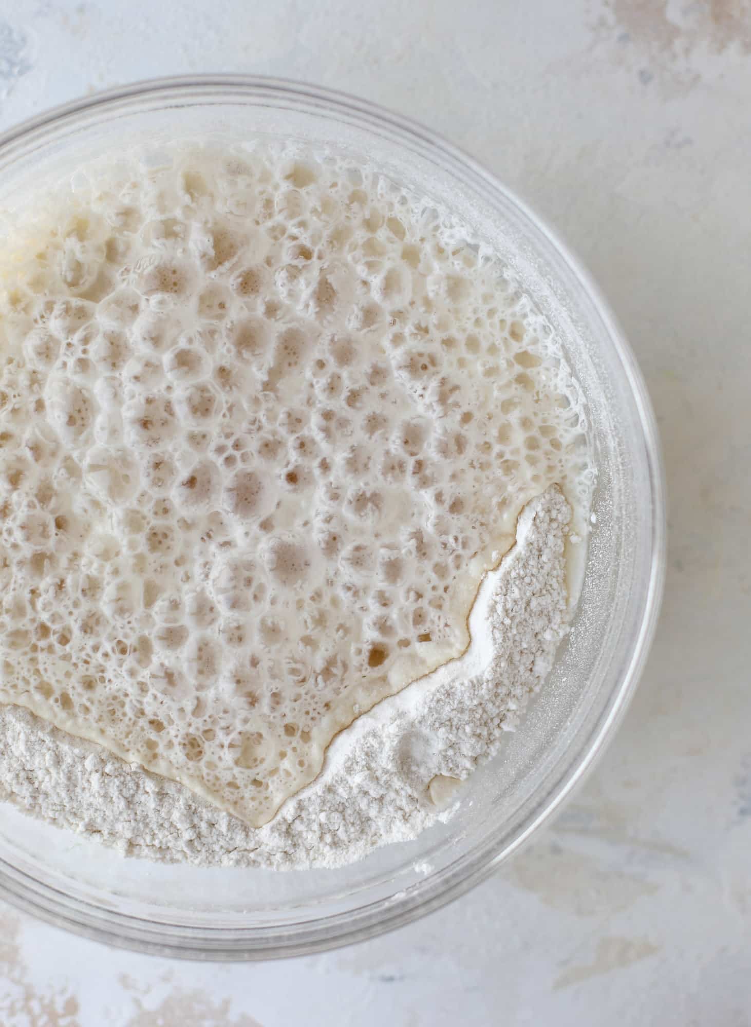 A perfect cold weather comfort food meal, Guiness pot pie has tender, fall-apart beef, lots of vegetables and is topped with buttery beer bread biscuits! I howsweeteats.com #guinness #potpie