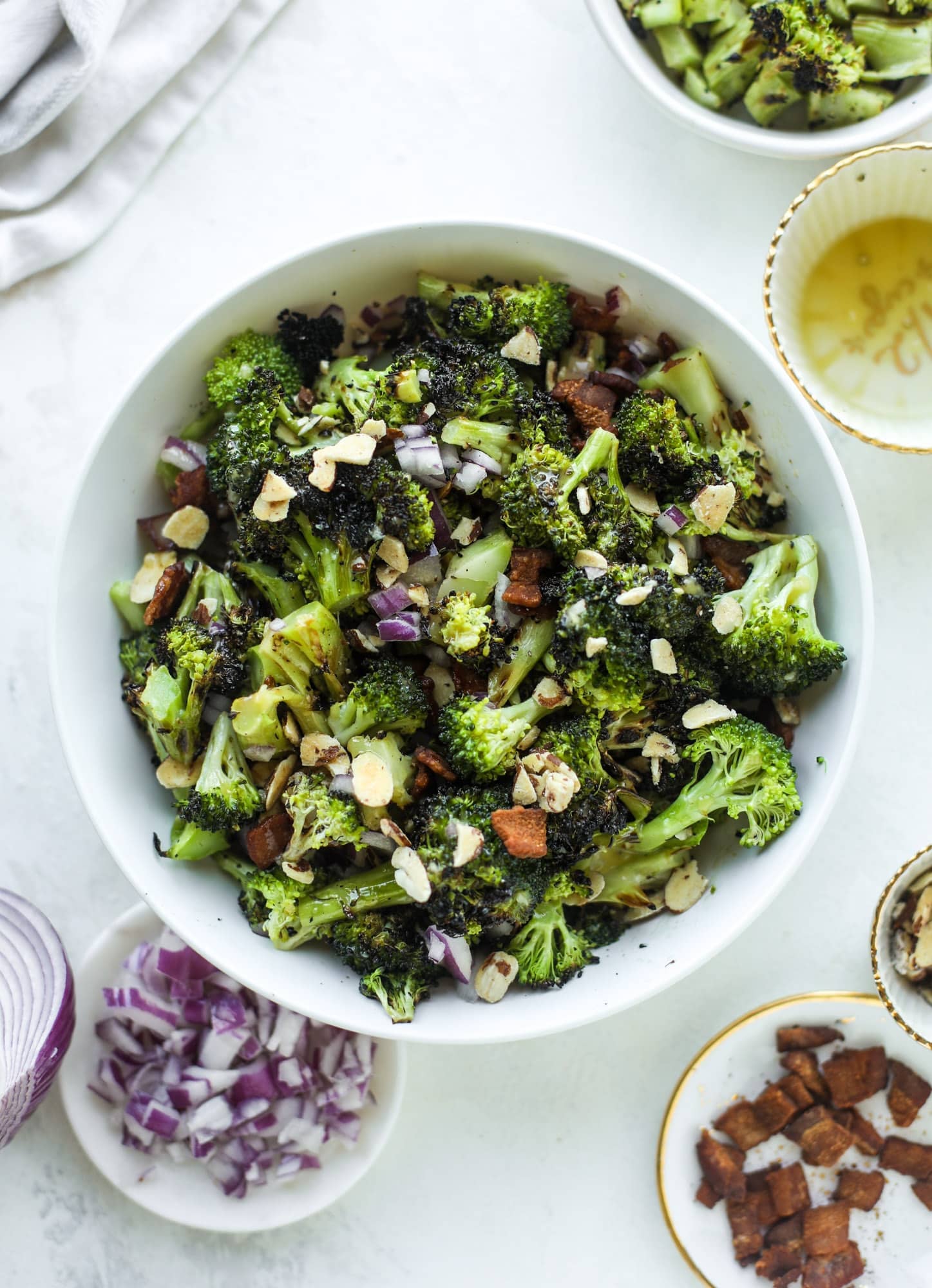 My favorite broccoli salad is here! This broccoli crunch salad is full of grilled broccoli, sliced almonds, diced scallions and crunchy bacon. It's so good!
