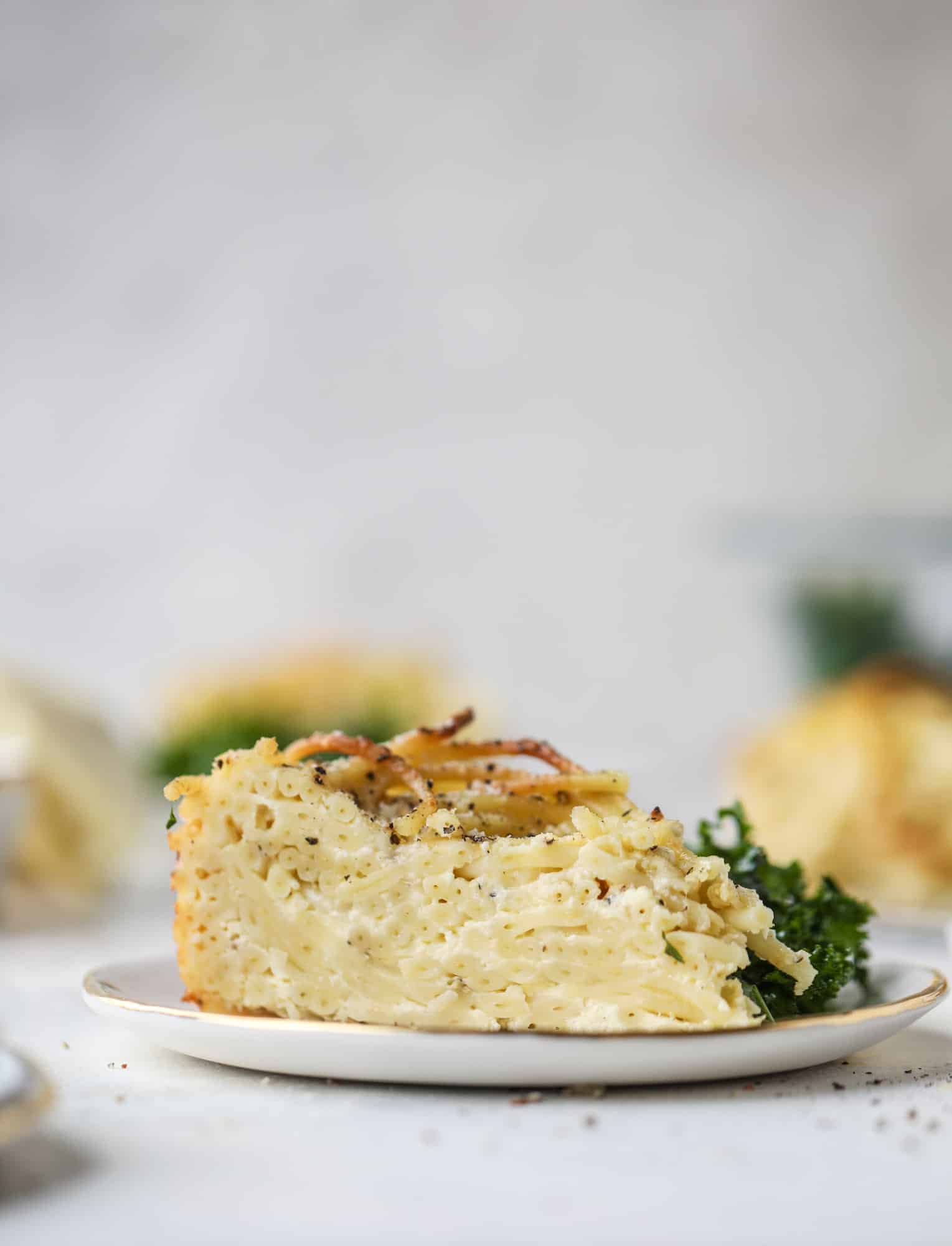 Hello lover! Cacio e pepe pie is made with parmigiano-reggiano cheese, black pepper and bucatini pasta. Baked until cheese and bubbly, it's to die for.