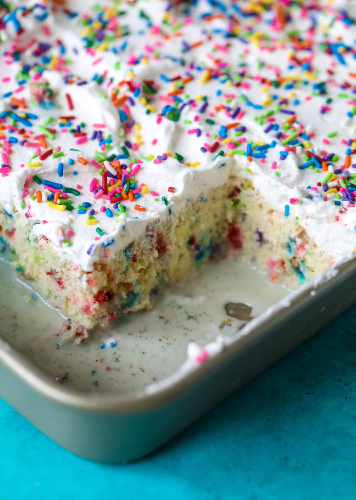A sprinkled twist on the classic tres leches! Tres leches confetti cake is full of rainbow sprinkles and tastes like heaven. So easy to make!