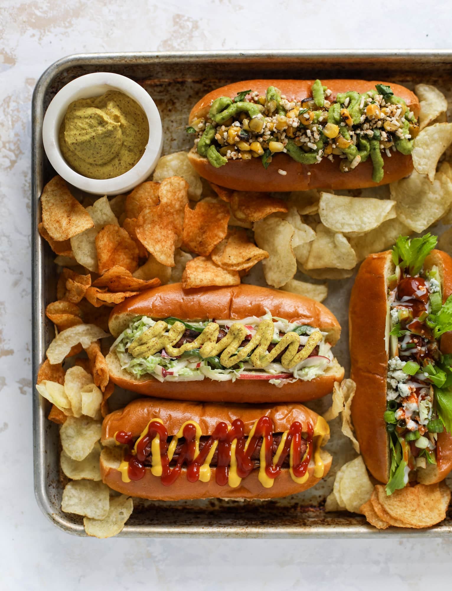 Nothing screams summer more than a hot dog bar! Grab your buns and dogs and a whole lot of toppings. This is super fun and delicious!