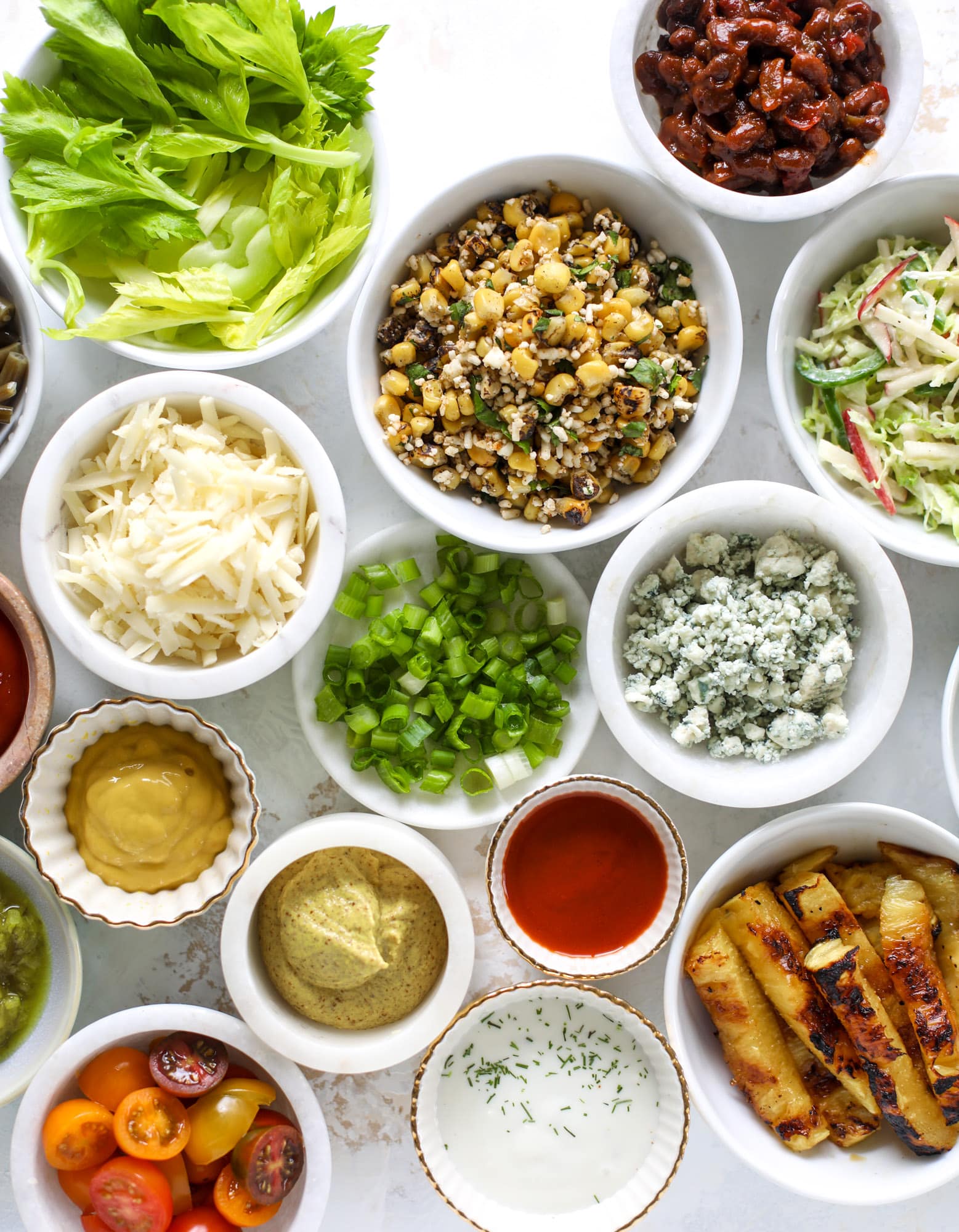 Nothing screams summer more than a hot dog bar! Grab your buns and dogs and a whole lot of toppings. This is super fun and delicious!