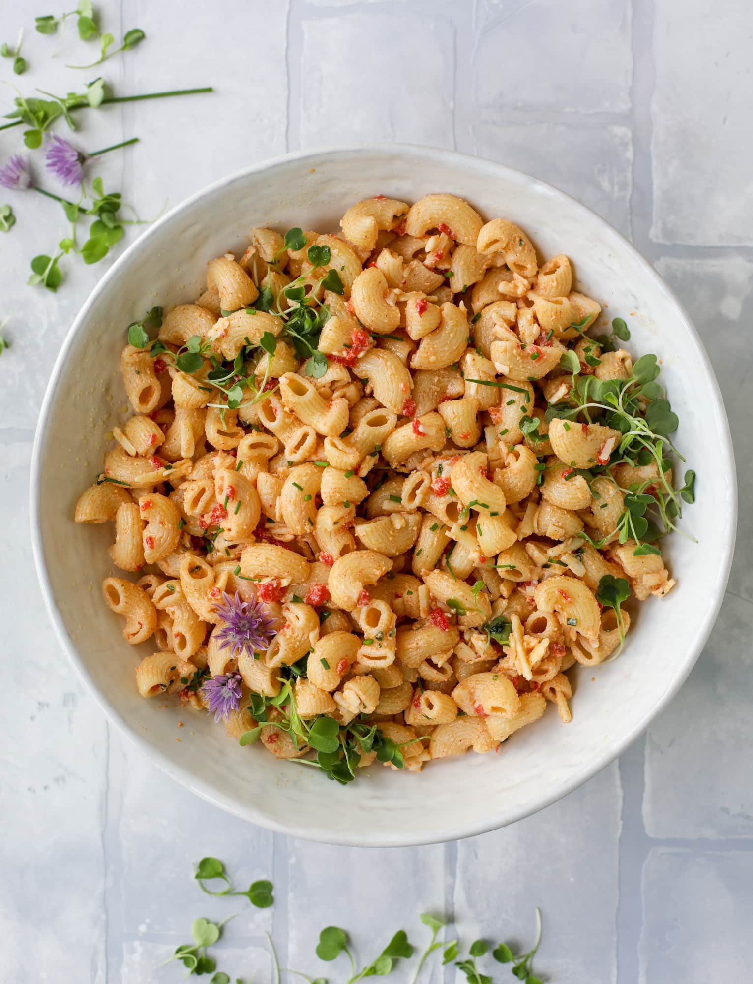 This pimento cheese pasta salad is the perfect summer side dish! All the flavor of pimento cheese and all the comforts of pasta salad, in one bowl!