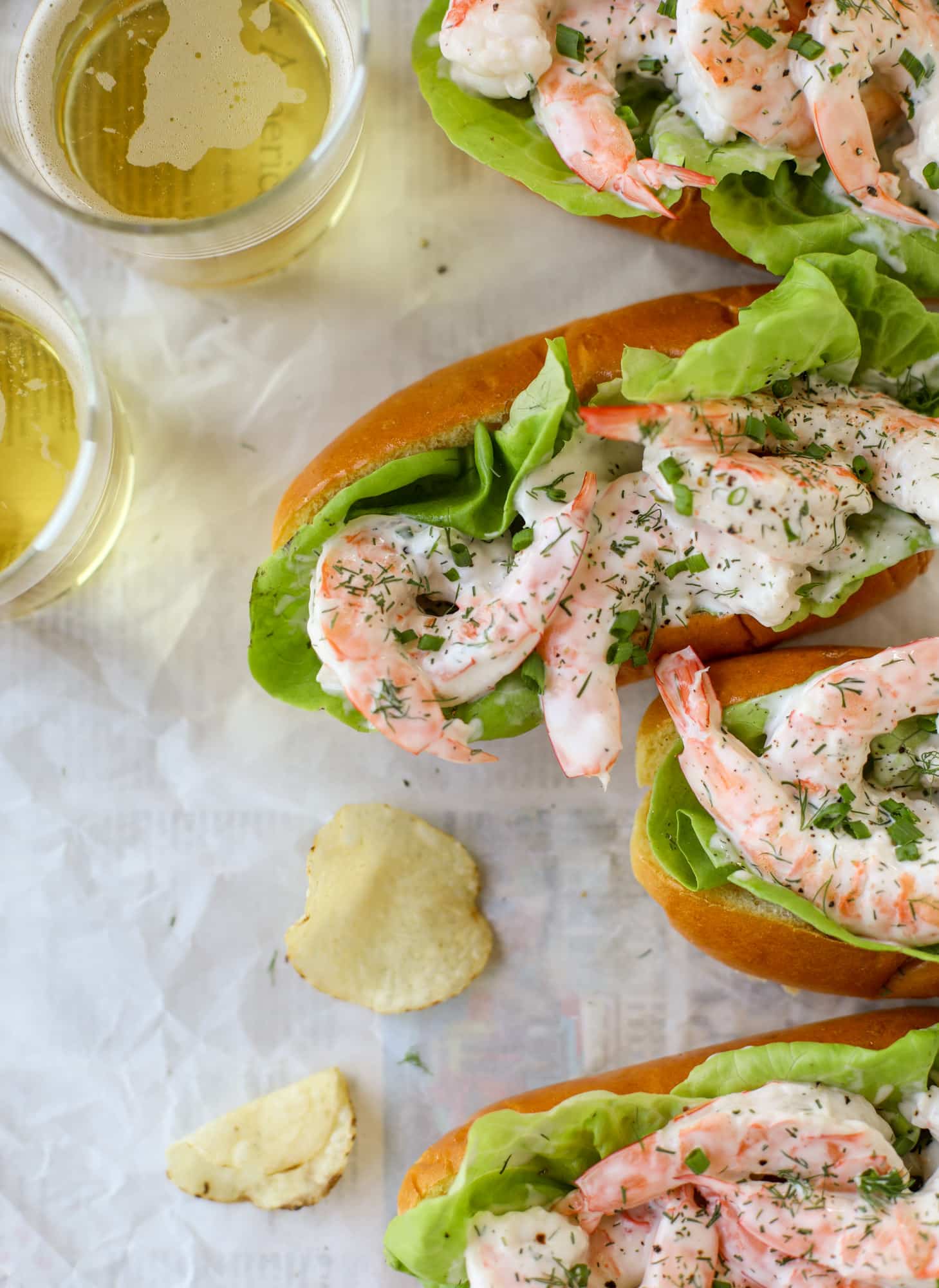 These shrimp salad rolls are my go-to simple, easy, no-cook dinner for hot summer day. Serve with pickles, potato chips and a spritz of lemon!