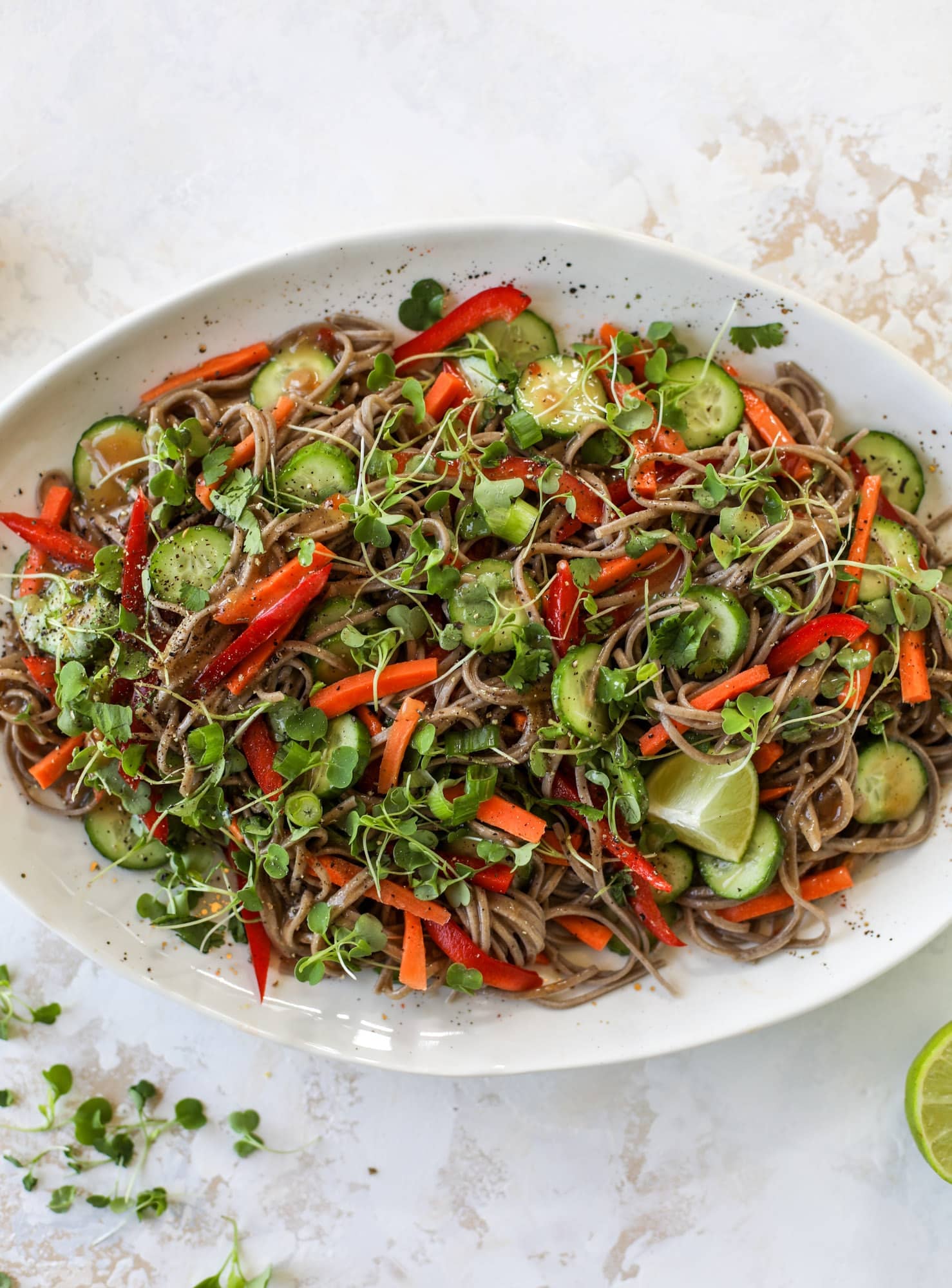 This grilled thai pork tenderloin is so easy, super flavorful, and the perfect weeknight meal when you serve it with a soda noodle salad. soba noodle salad