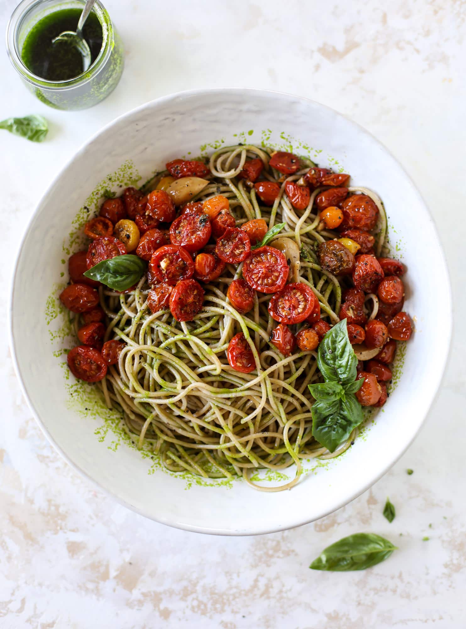 This tomato basil pasta is a labor of love! Made with slow roasted tomatoes, basil oil and tons of parmesan, it's ridiculously full of flavor.