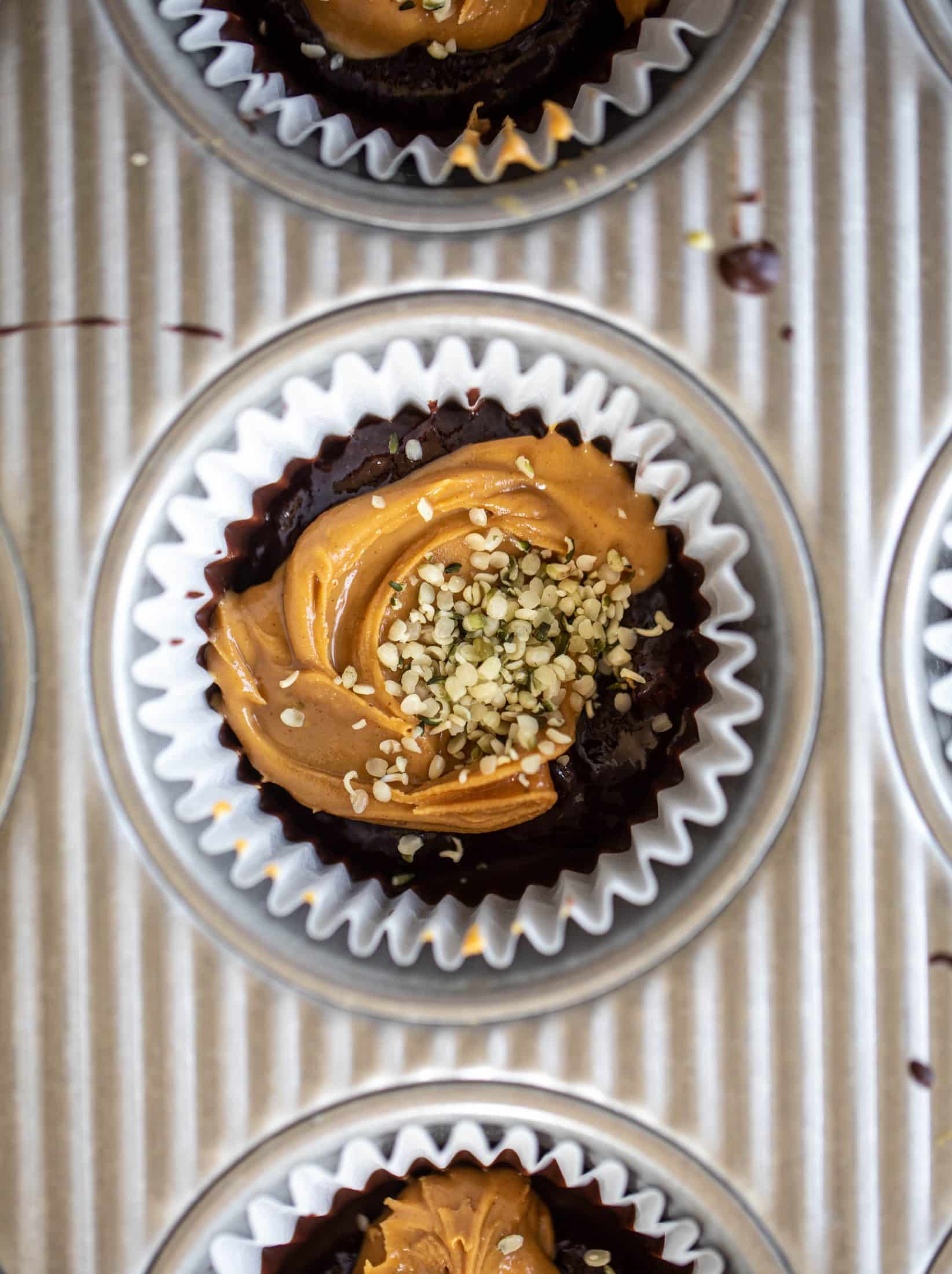 These peanut butter and jelly cups are the best homemade treat ever! Use your favorite jam and add a sprinkle of chia and hemp hearts. So good!