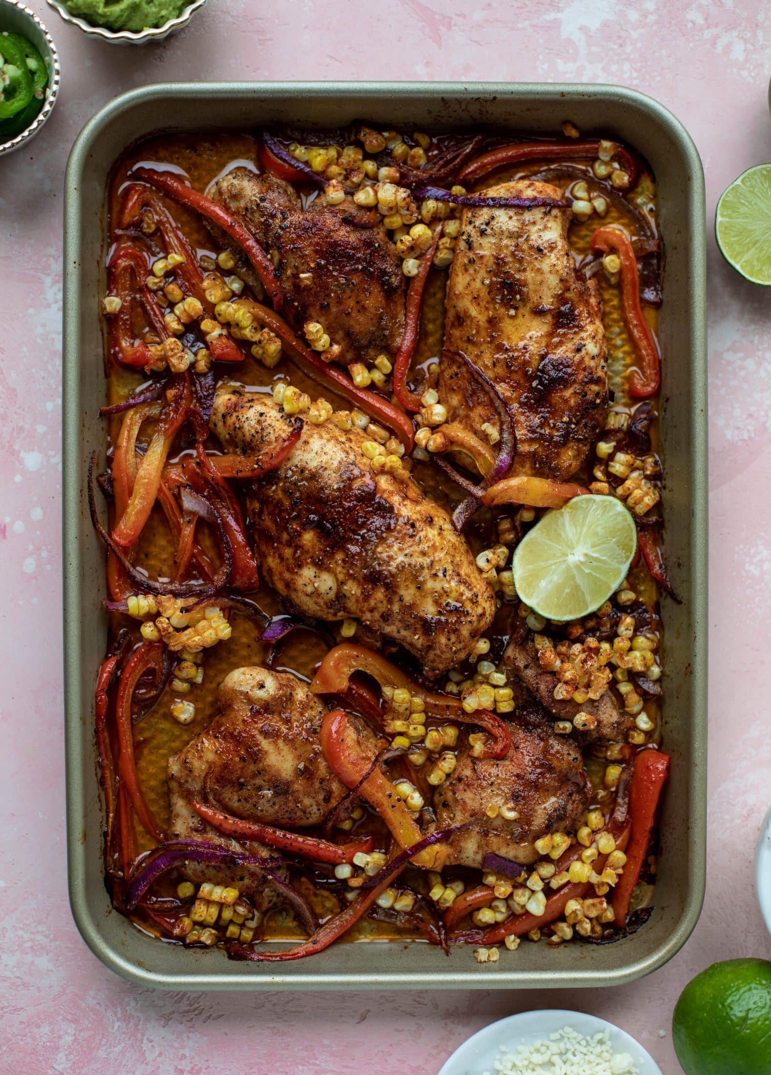 This sheet pan nacho chicken recipe results in the juiciest, more flavorful chicken that can be served in a multitude of ways!