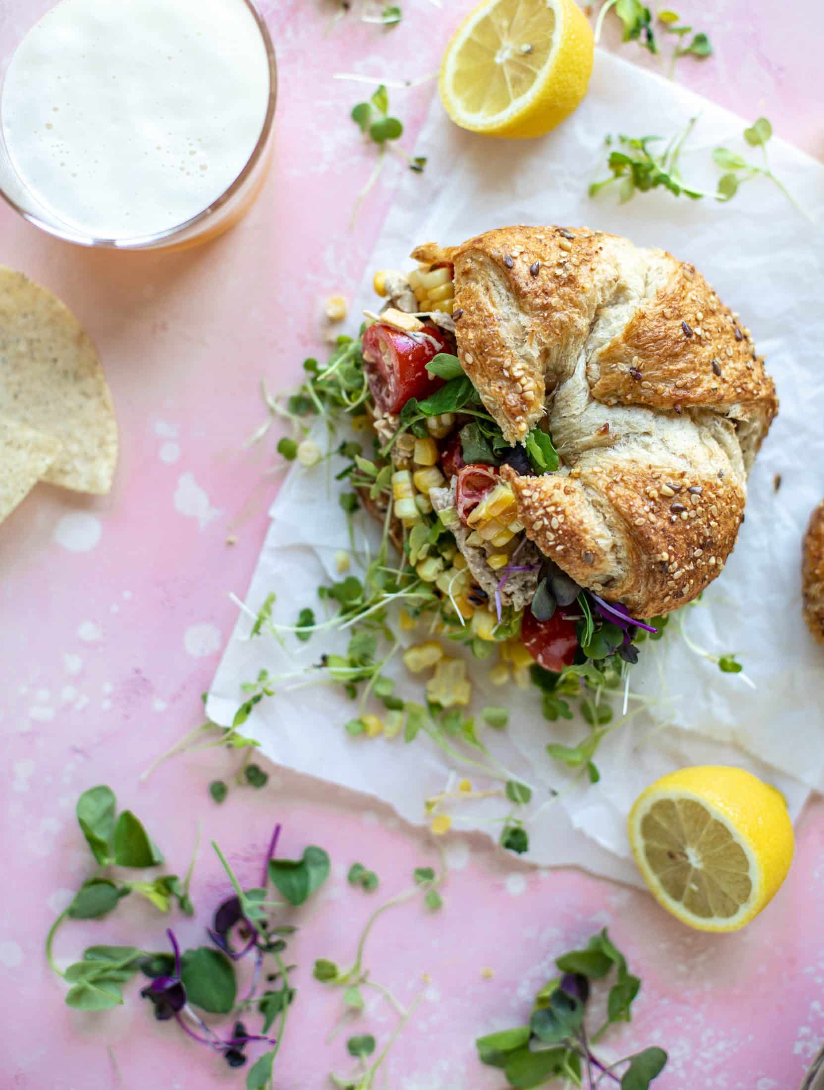 This smoky summer chicken salad is incredible! So much flavor from grilled chicken, sweet cherry tomatoes, corn, cheddar cheese and a secret ingredient!