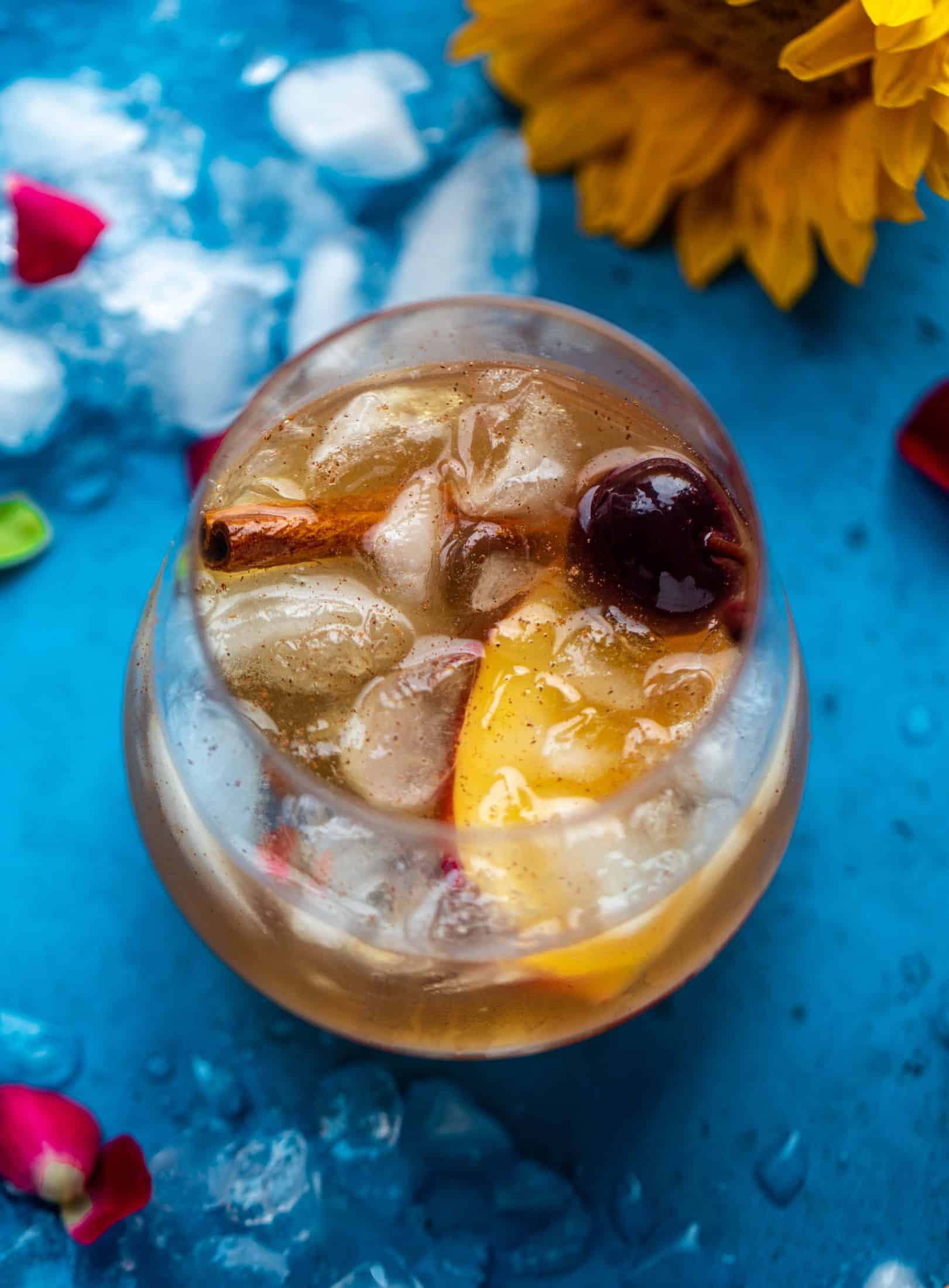 Everything I love about fall is in one little cocktail right here! If you love whiskey, this cinnamon spiced cider and splash of maple makes a sour so good!
