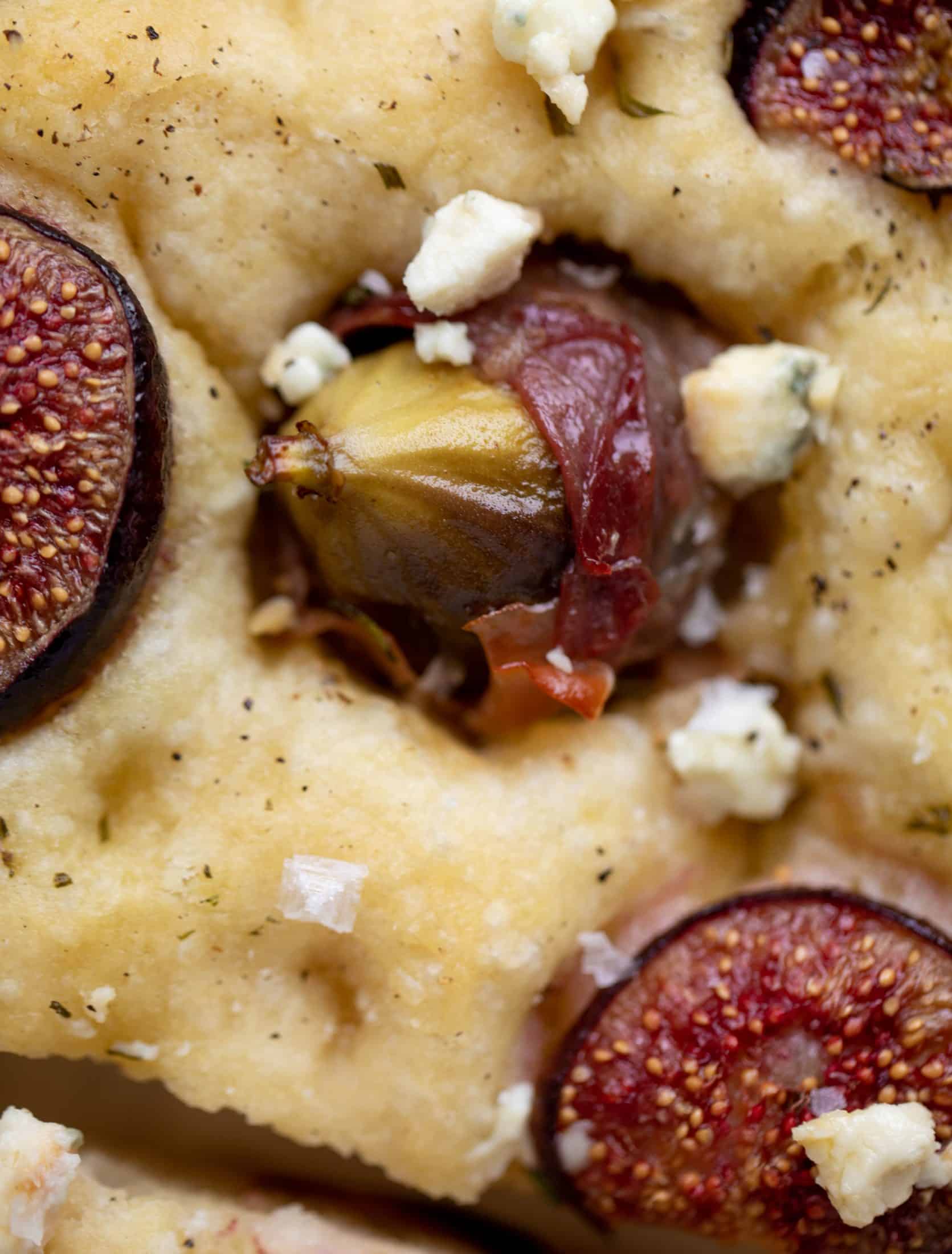 This stuffed fig focaccia bread is such an amazing way to use figs! Golden, toasty, salted focaccia studded with fig jewels. It's delicious and pretty!