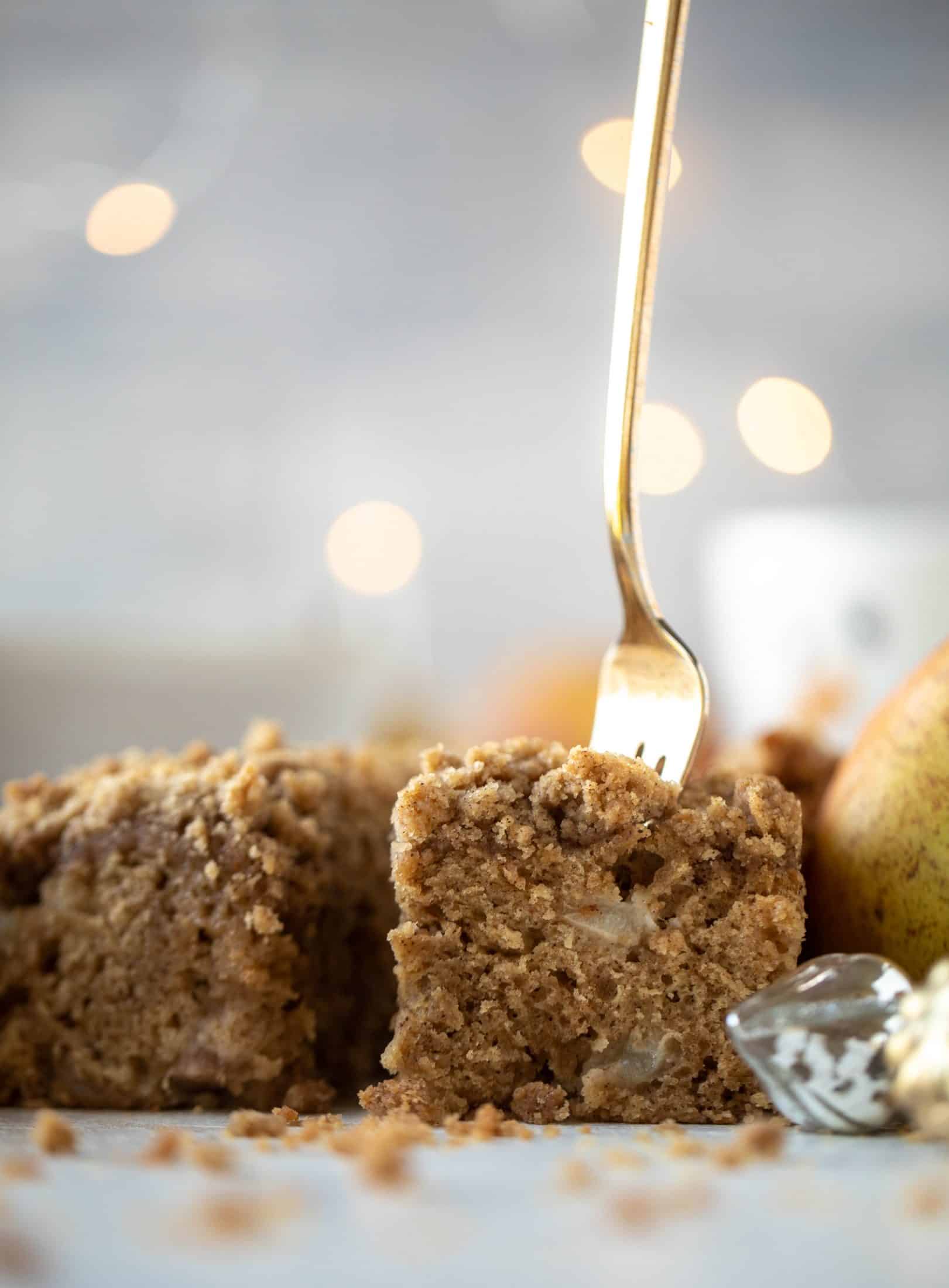 A pear coffee cake made with brown butter and greek yogurt. It's delicious for breakfast or brunch and the crumb topping is unbelievable.