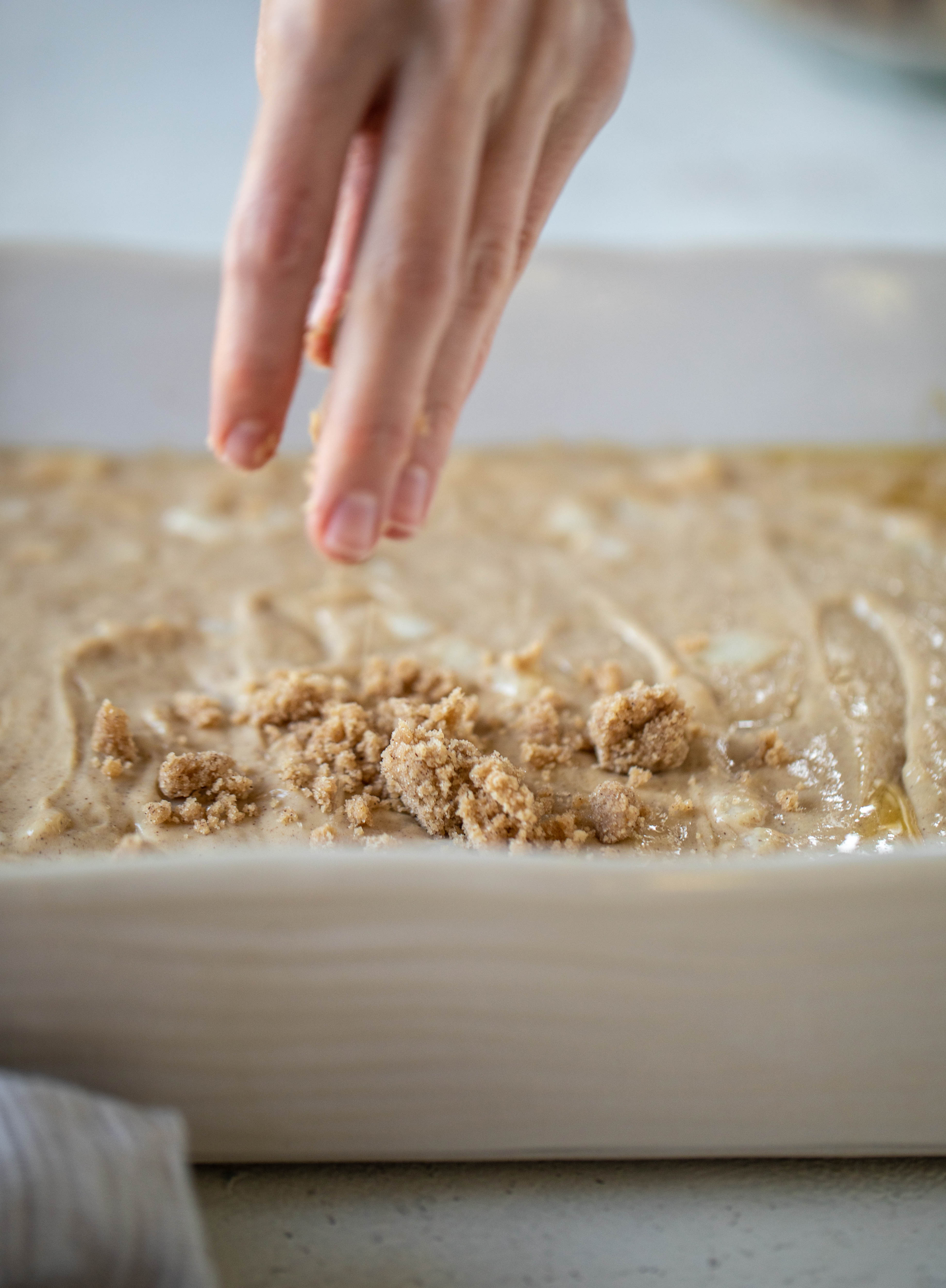 A pear coffee cake made with brown butter and greek yogurt. It's delicious for breakfast or brunch and the crumb topping is unbelievable.