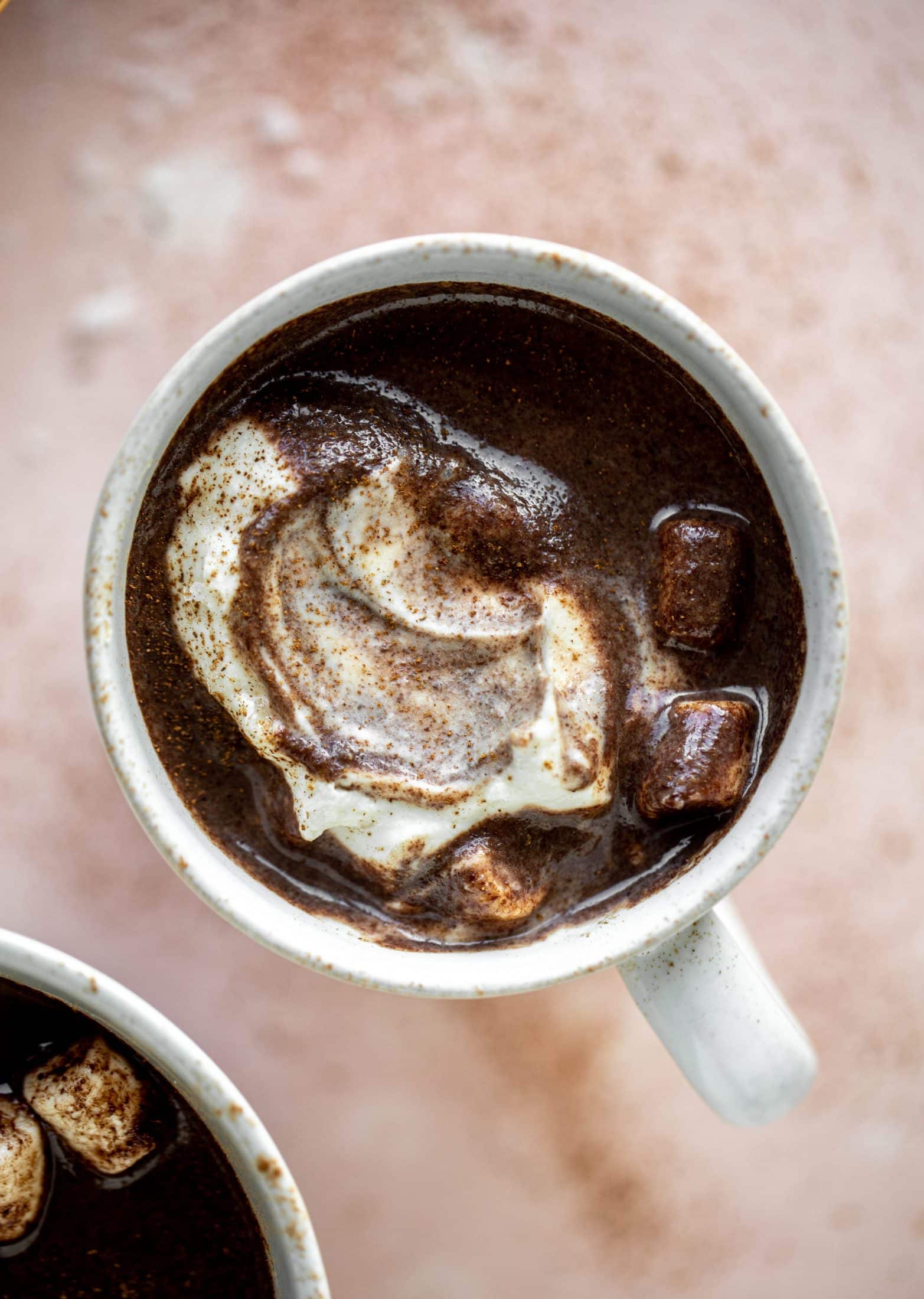 This salted peanut butter hot chocolate is a hug in a mug! It's super decadent, indulgent and cozy. Everyone's favorite flavors in one drink!