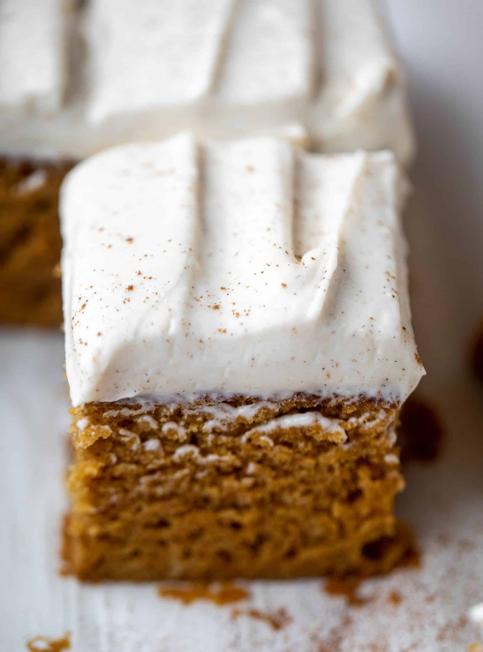 This pumpkin sheet cake is a legit pumpkin dream cake! It's so moist and fluffy and flavorful. With a blanket of cinnamon cream cheese frosting!
