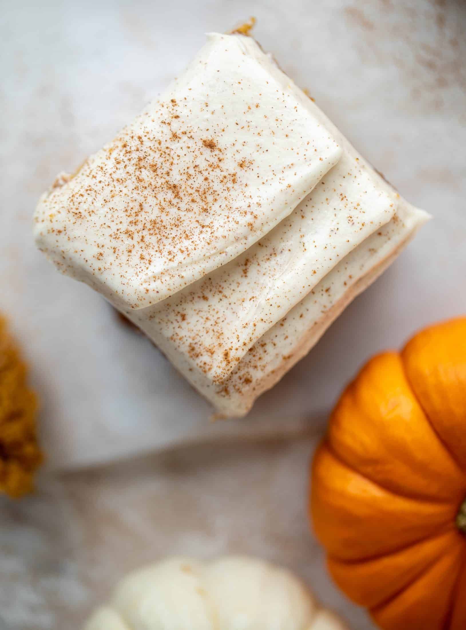 This pumpkin sheet cake is a legit pumpkin dream cake! It's so moist and fluffy and flavorful. With a blanket of cinnamon cream cheese frosting!