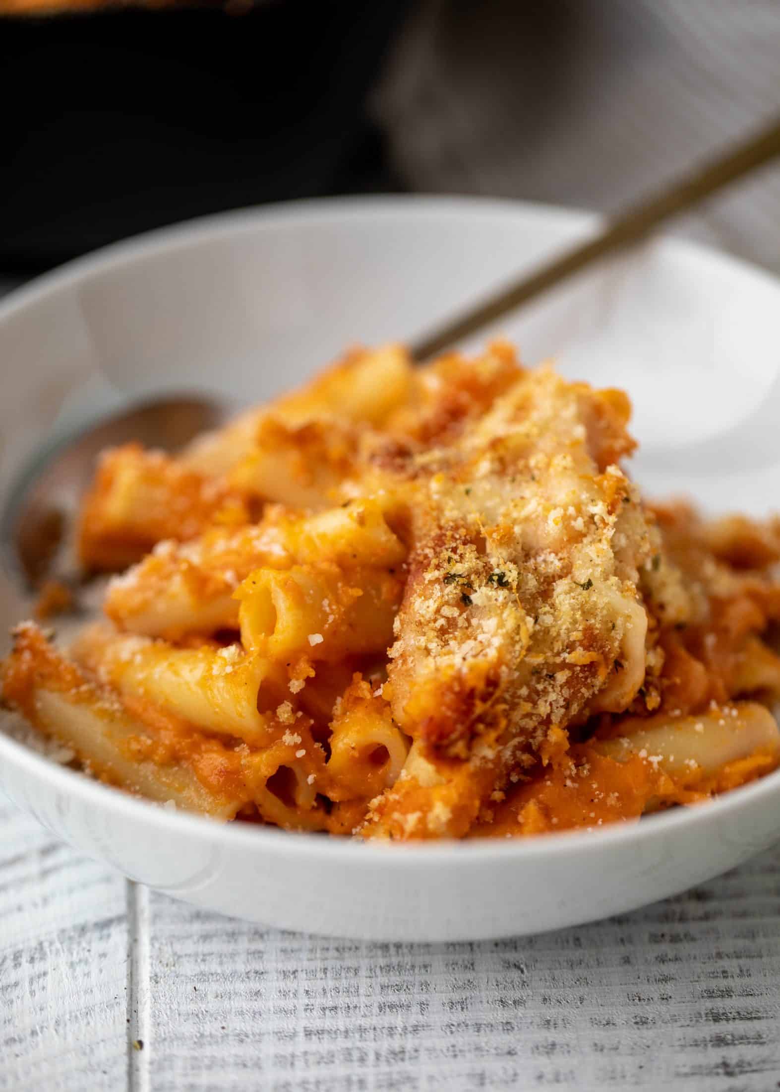Butternut squash baked ziti is the ultimate comfort food! Squash, fire roasted tomatoes, parmesan and mozzarella make the best sauce ever.