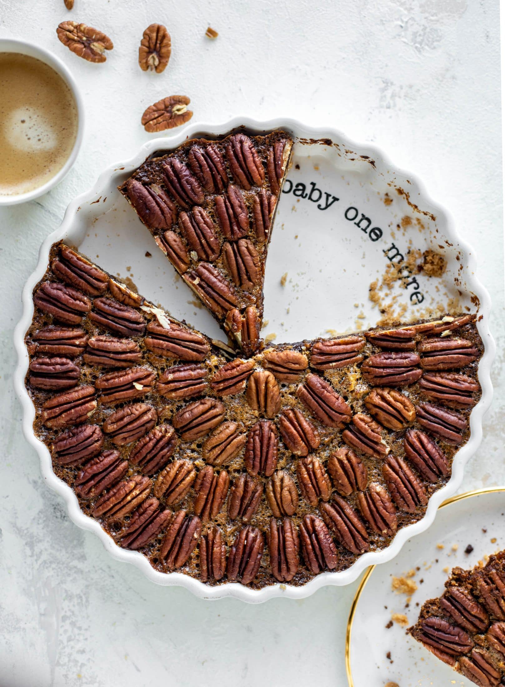 This chocolate pecan tart is the best dessert ever. Chocolate fudge and gooey pecan pie in a shortbread crust - everyone goes crazy!