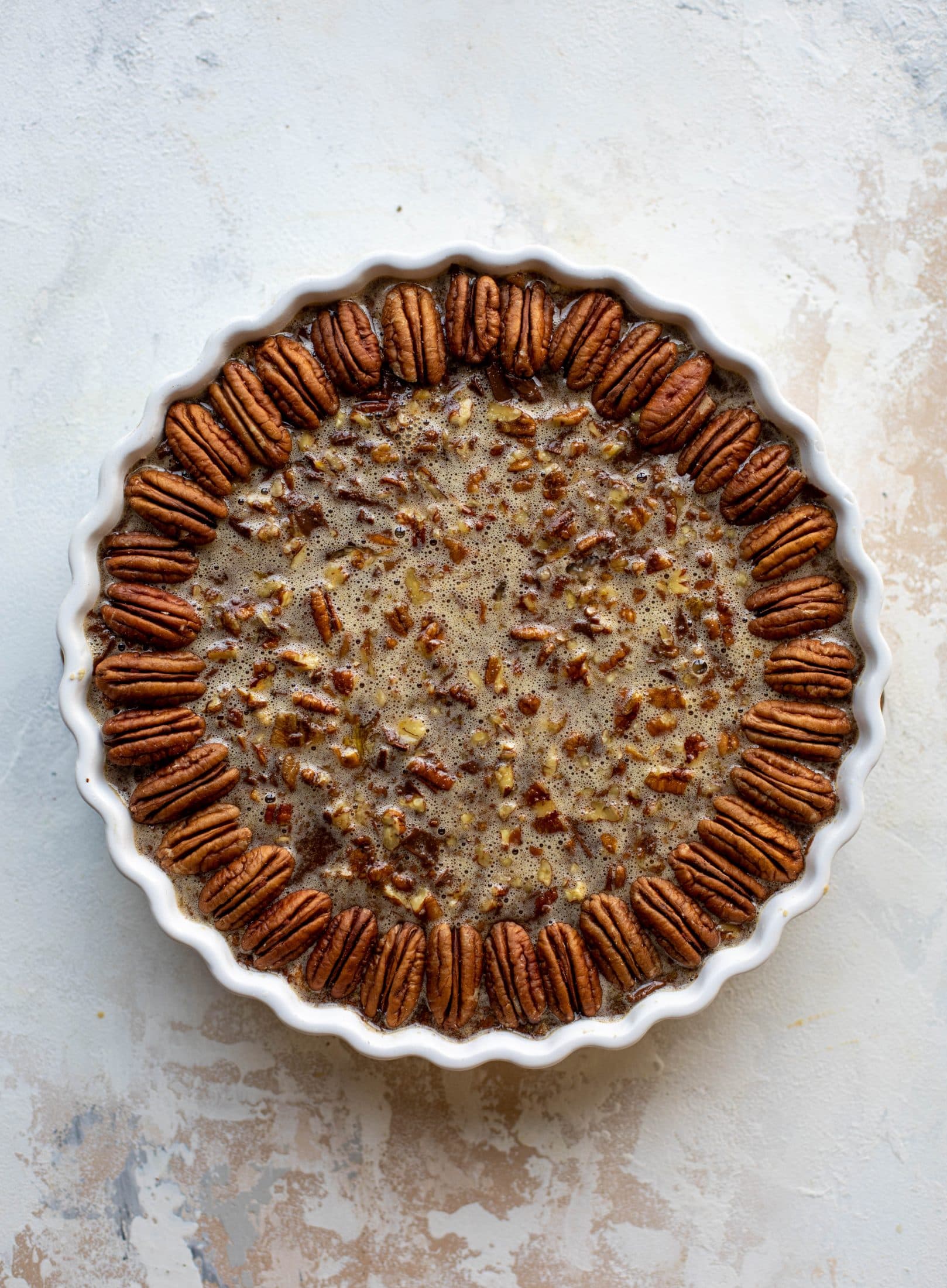 pecan tart prepped for the oven