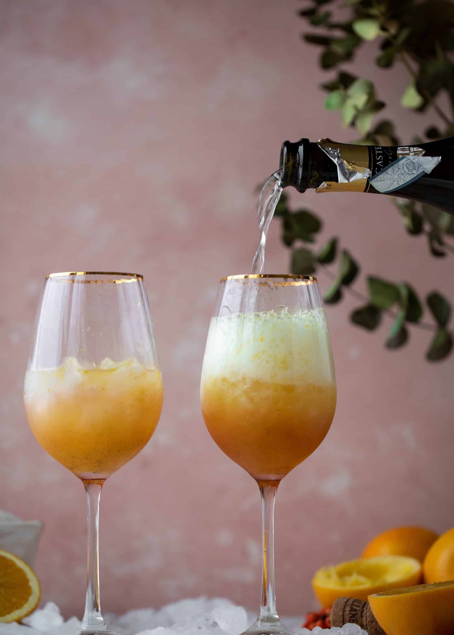 The spiced orange spritzer is a fancier mimosa and similar to an aperol spritz! A fresh spiced orange juice based mixed with prosecco and seltzer. So good!