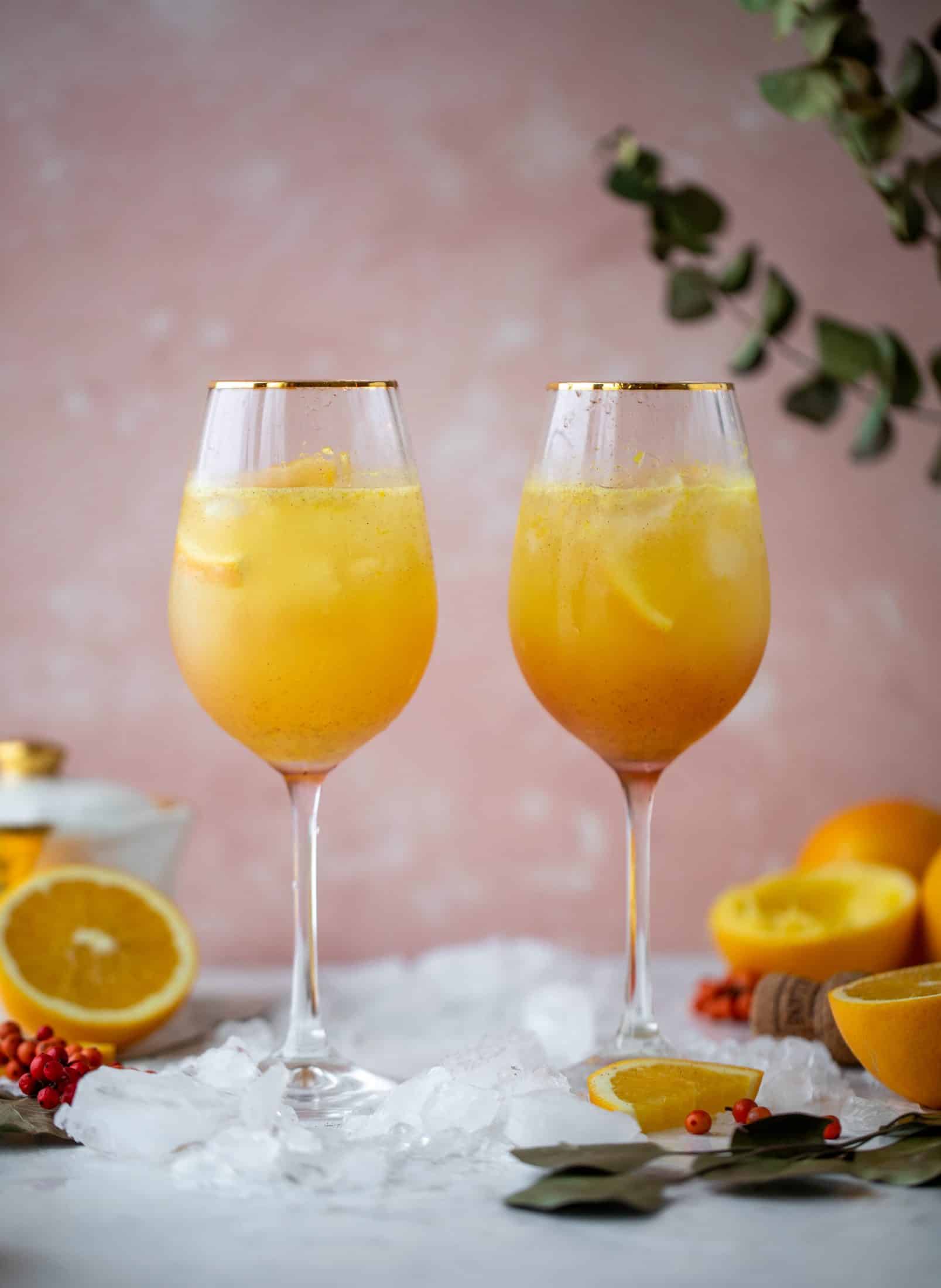 The spiced orange spritzer is a fancier mimosa and similar to an aperol spritz! A fresh spiced orange juice based mixed with prosecco and seltzer. So good!