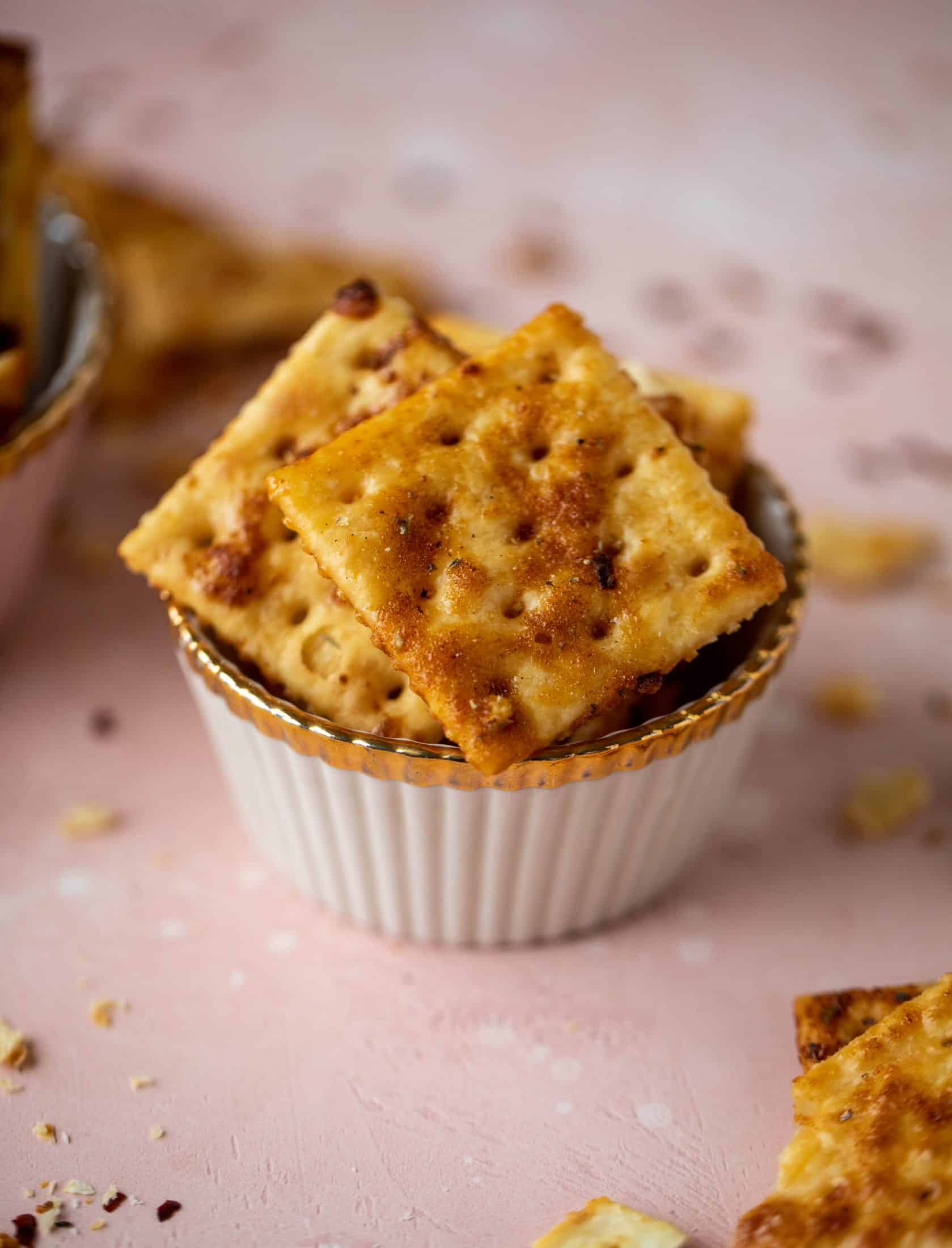 These super easy fire crackers are such a simple recipe to make! Bake the crackers with spice and butter for the perfect party snack.