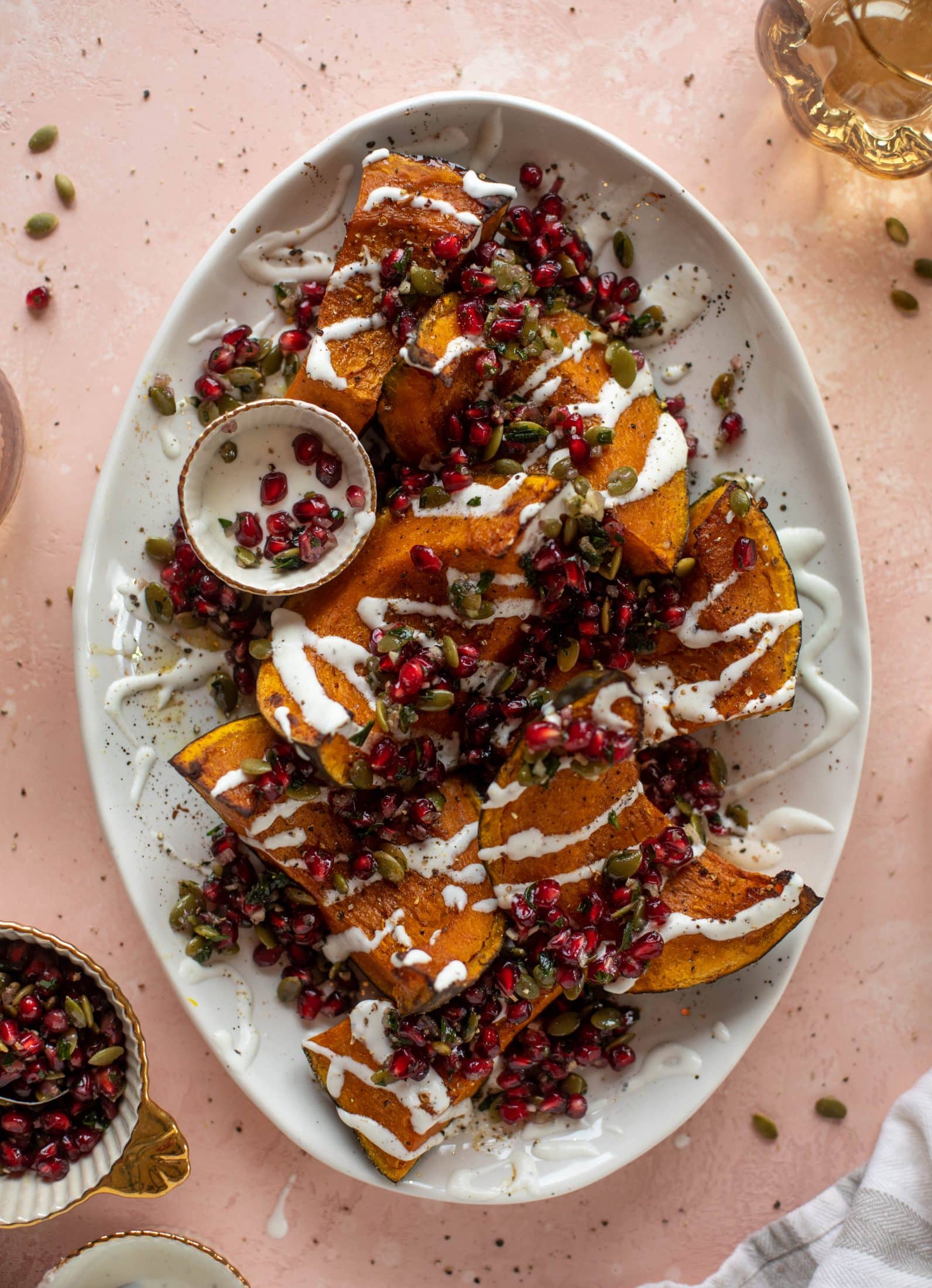 This roasted kabocha squash is caramely and naturally sweet, drizzled with whipped goat cheese and topped with pomegranate pepita relish. It's unreal!