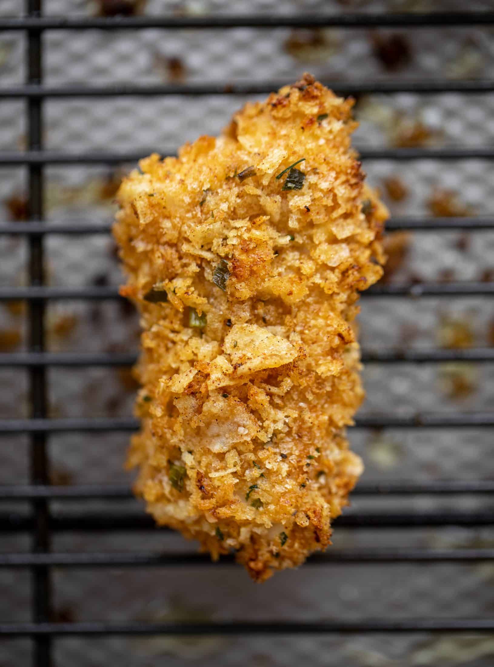 These crispy homemade fish sticks are flavored with lemon and garlic! They are super crunchy and delicious when dipped in the jalapeño tartar sauce.