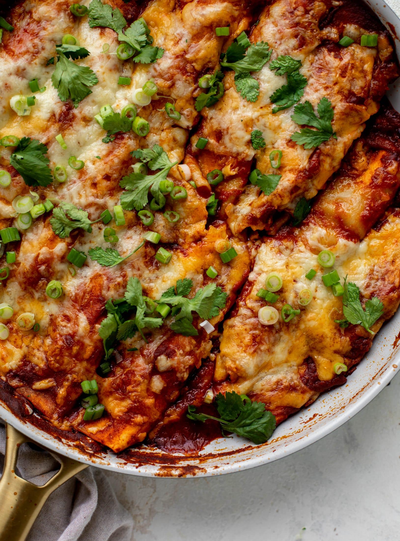 Chipotle chicken skillet enchiladas are loaded with flavor and come together so quickly! They are the perfect spicy weeknight meal.