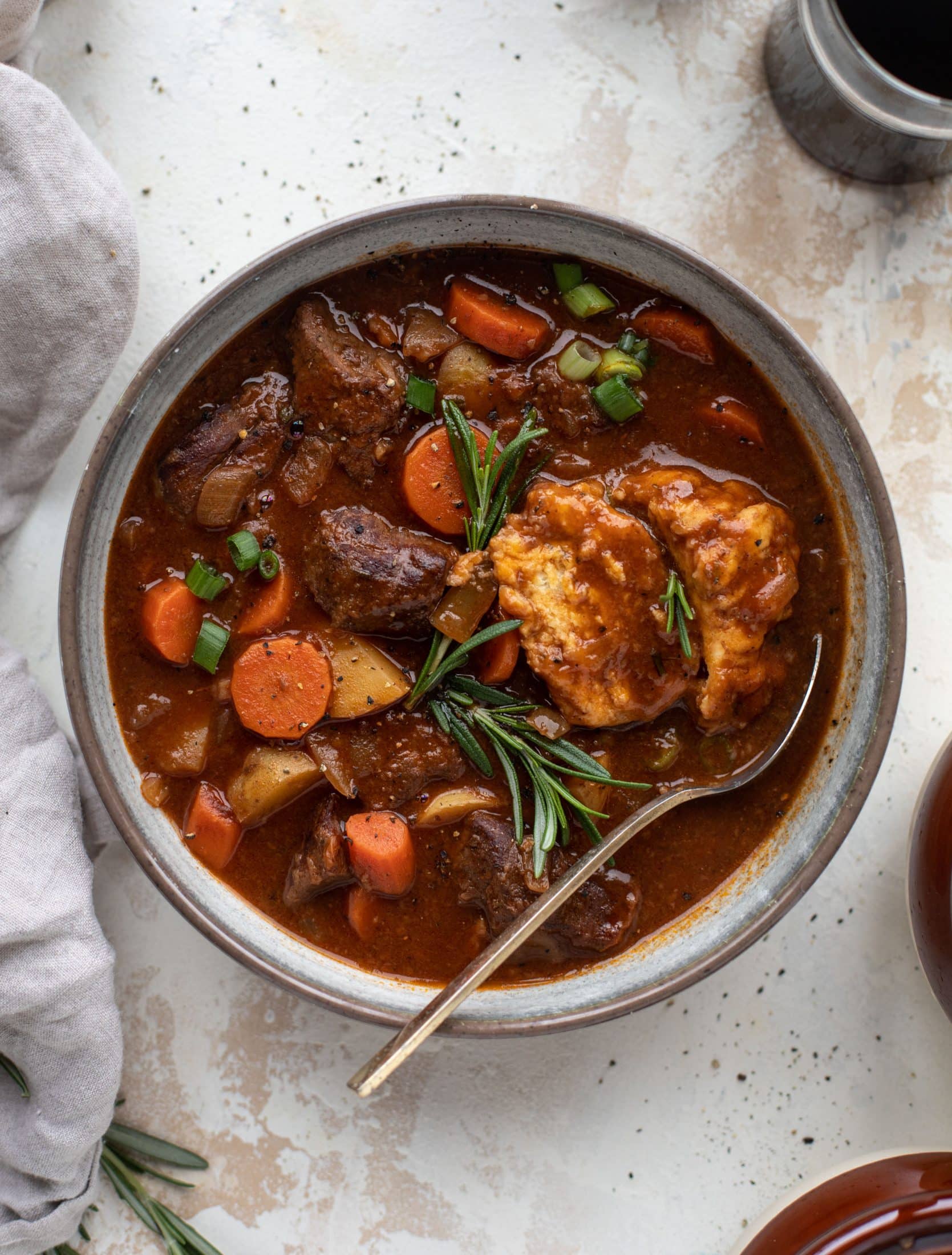 My new favorite soup! Irish stout beef stew is flavorful and hearty and topped with delicious herb dumplings. Perfect comfort food.