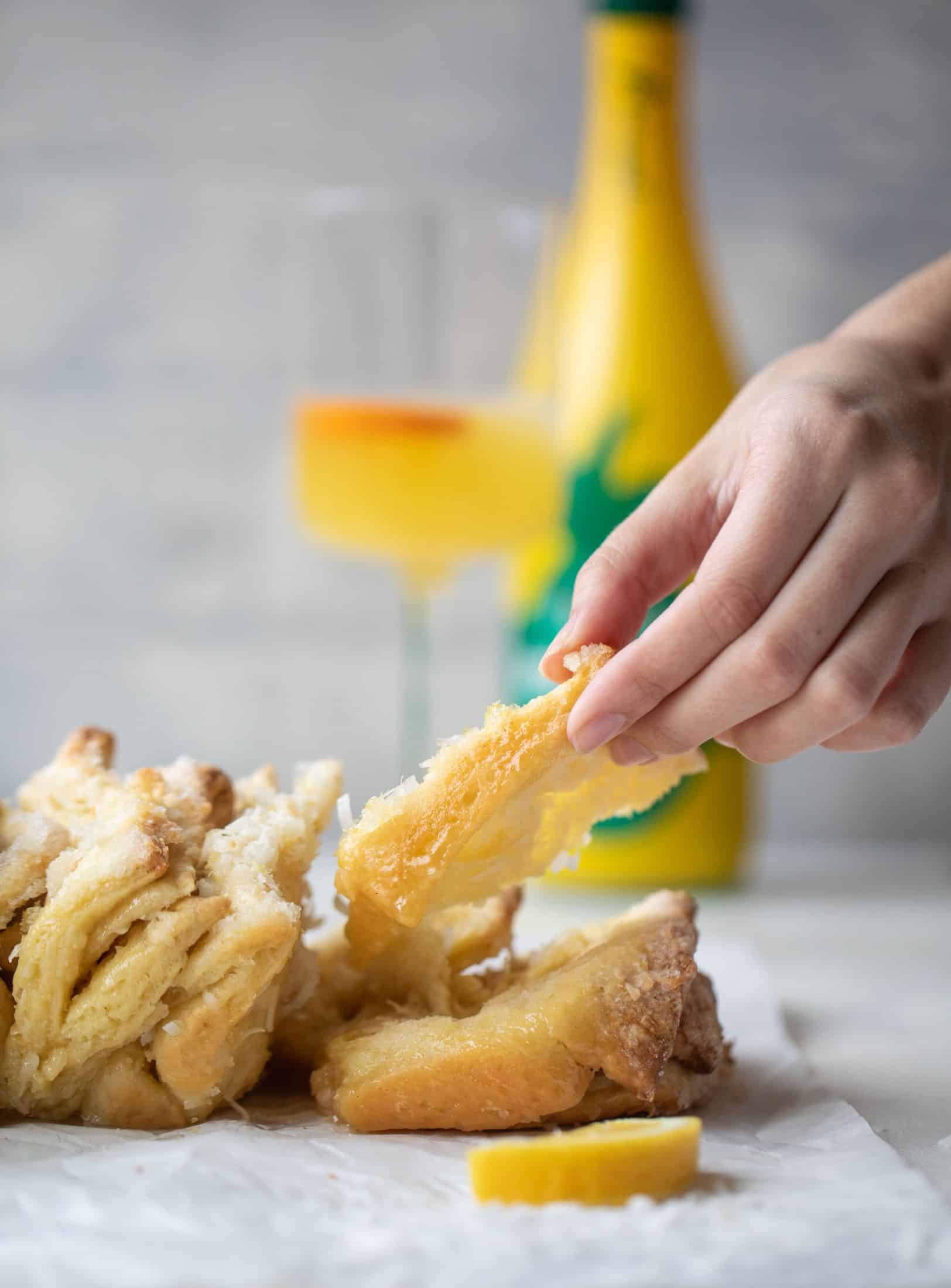 This lemon coconut bread is a pull apart dream! It's perfect for brunch or dessert with the perfect amount of fluffiness.