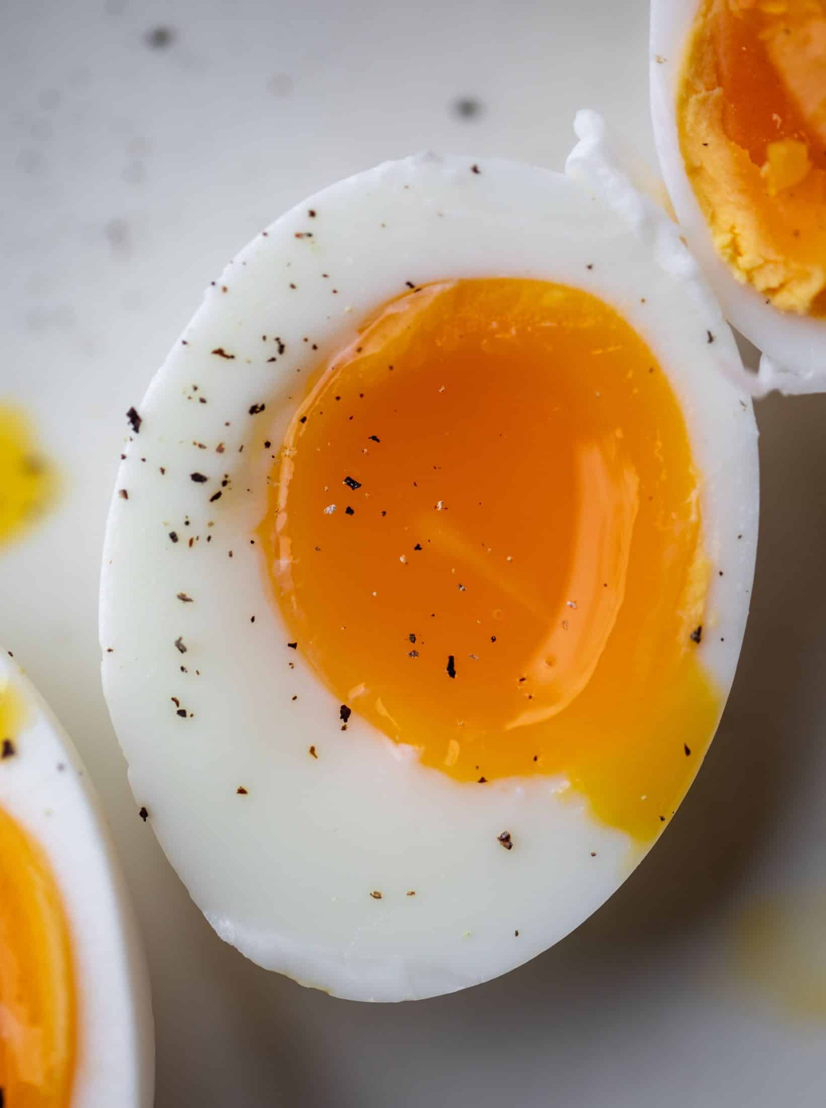 This shaved asparagus salad is tossed with a delicious parmesan vinaigrette, then topped with soft boiled eggs and finished with crunchy garlic breadcrumbs!